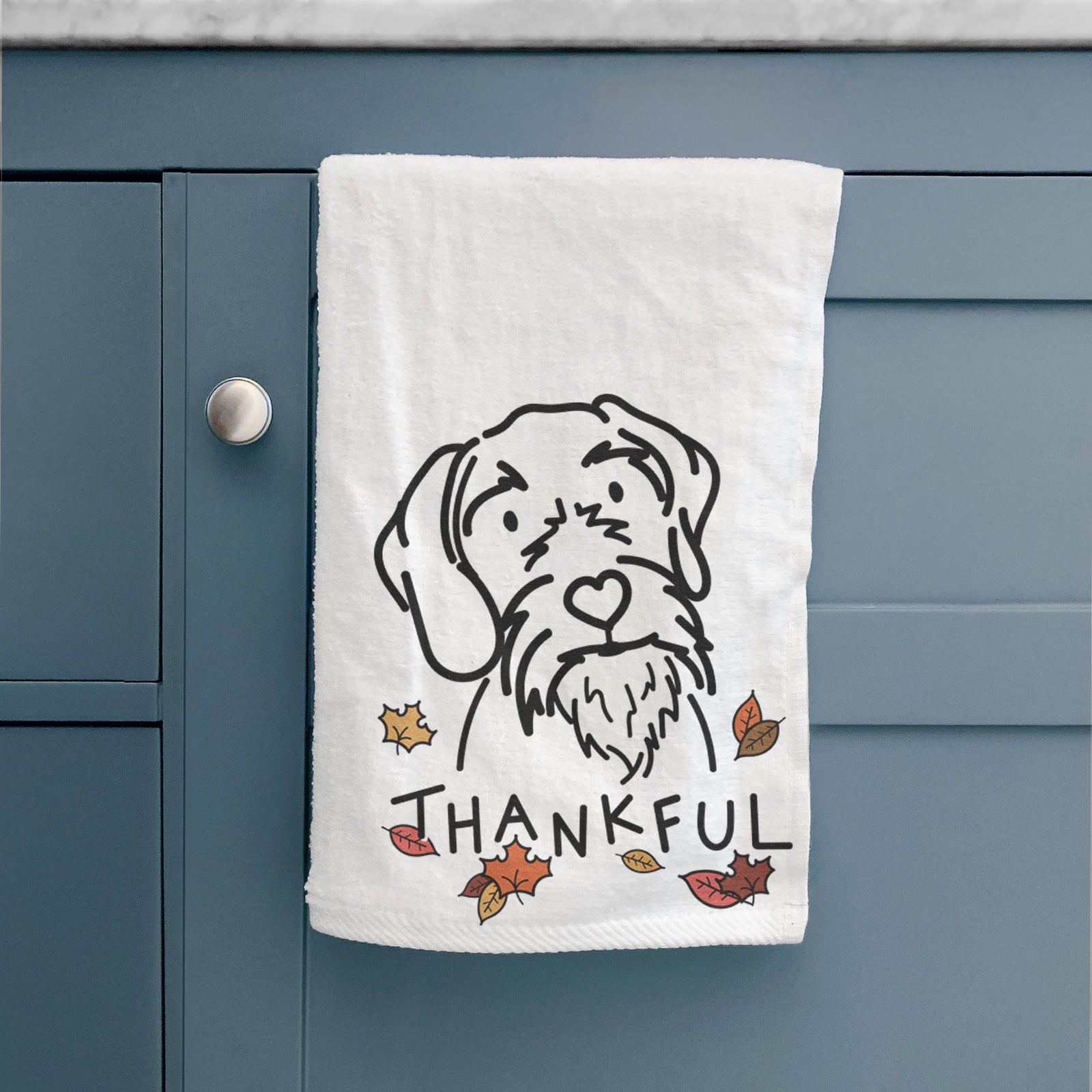 Minimalist line drawing of Buck the German Wirehaired Pointer with 'Thankful' lettering on a hand towel