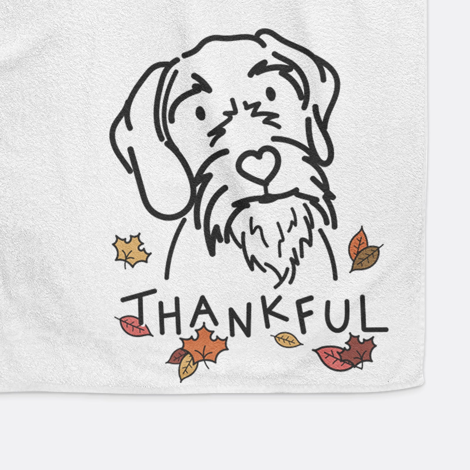 Minimalist line drawing of Buck the German Wirehaired Pointer with 'Thankful' lettering on a hand towel