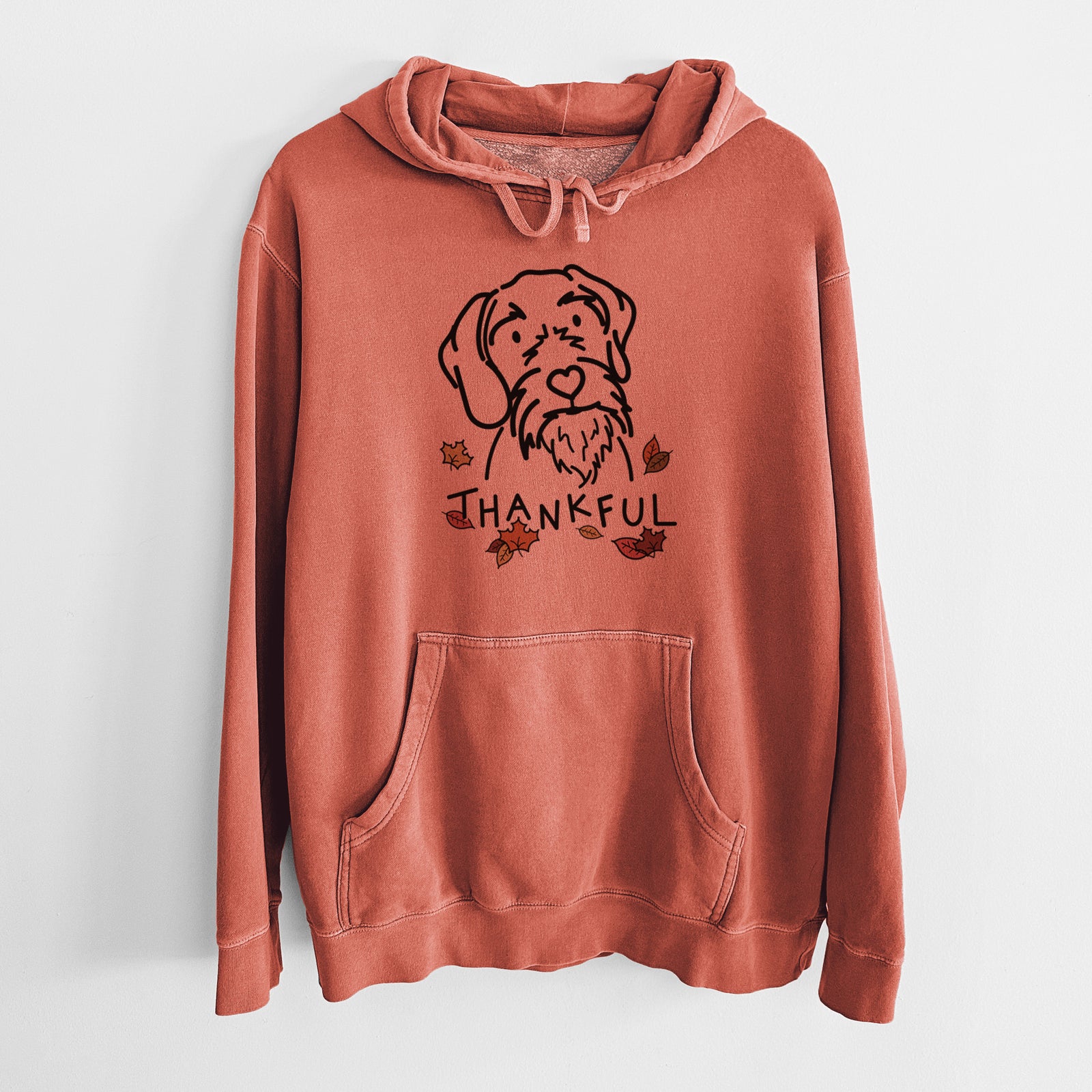 Minimalist line drawing of Buck the German Wirehaired Pointer with 'Thankful' lettering on an Amber Unisex pigment dyed hoodie