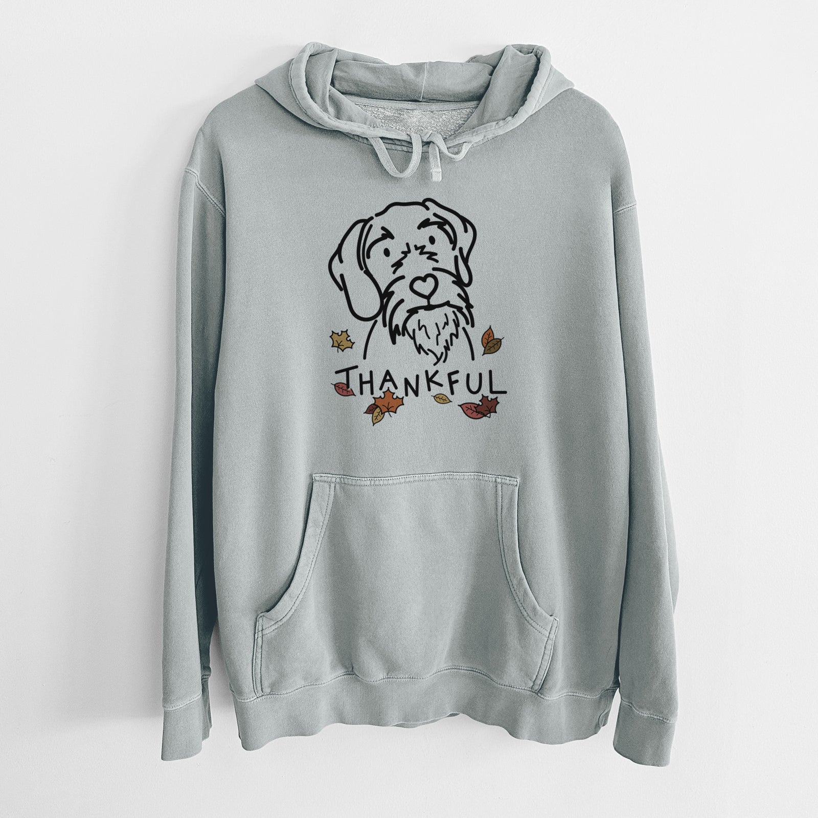 Minimalist line drawing of Buck the German Wirehaired Pointer with 'Thankful' lettering on a Sage Unisex pigment dyed hoodie