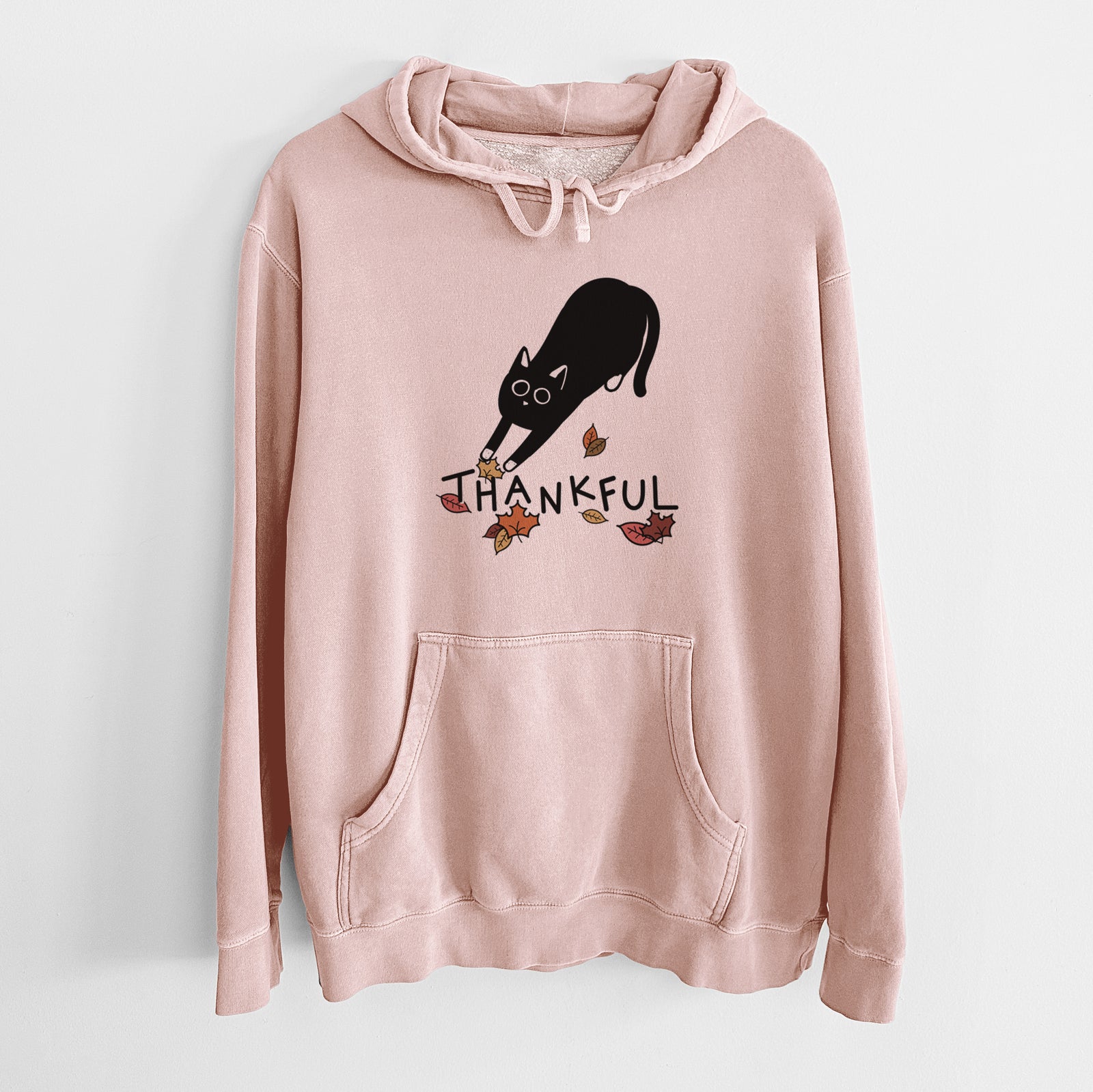 Minimalist line drawing of Bug the Black Cat with 'Thankful' lettering on a Dusty Pink Unisex pigment dyed hoodie