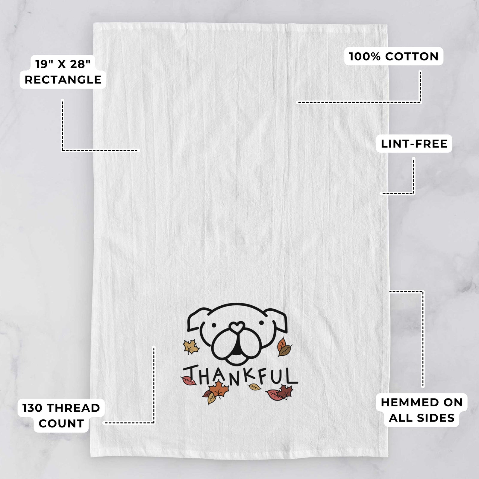 Minimalist line drawing of an English Bulldog with 'Thankful' lettering on a tea towel, with feature callouts: 19 x 28 inch rectangle, 100% cotton, lint-free, 120 thread count, hemmed on all sides