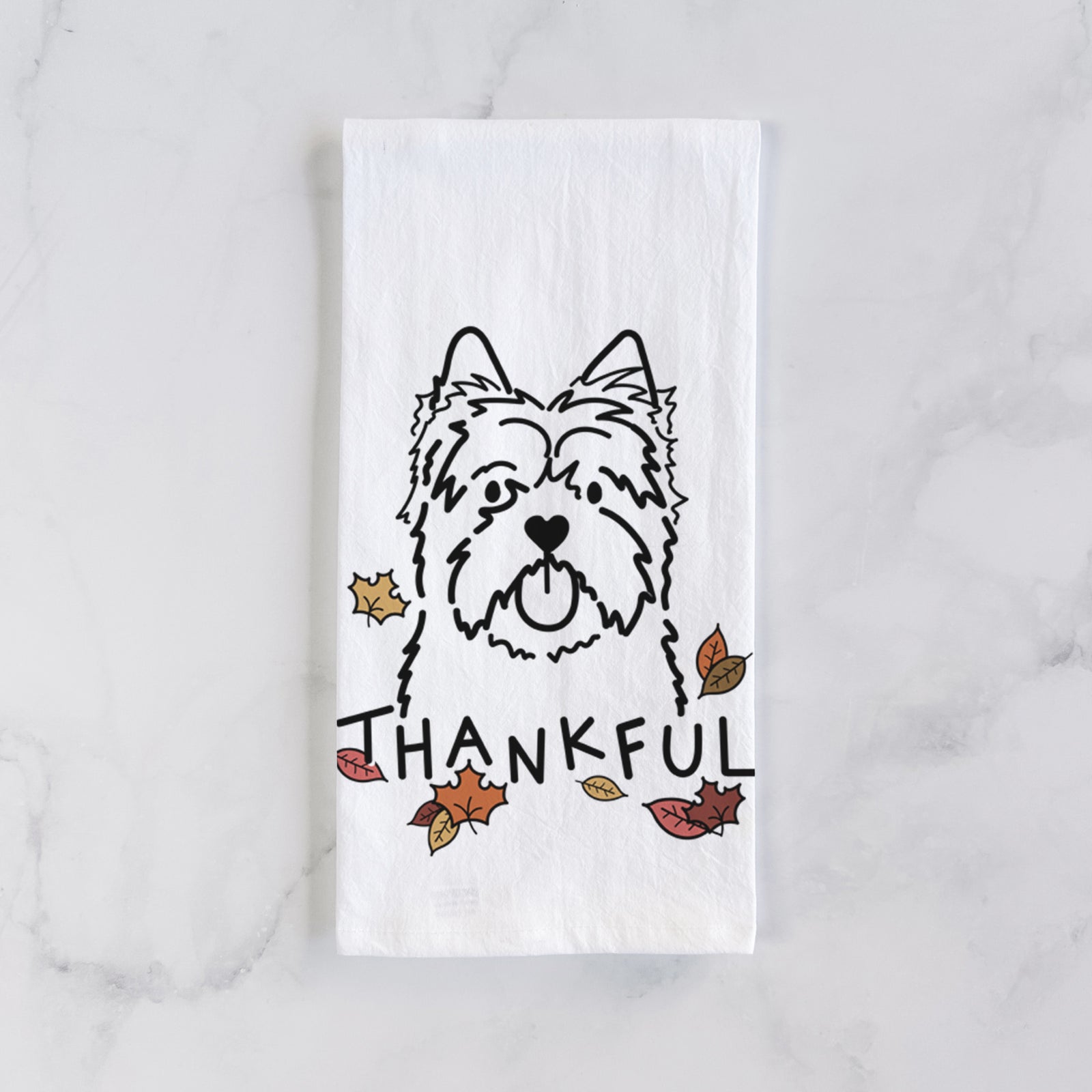 Minimalist line drawing of a Cairn Terrier with 'Thankful' lettering on a tea towel