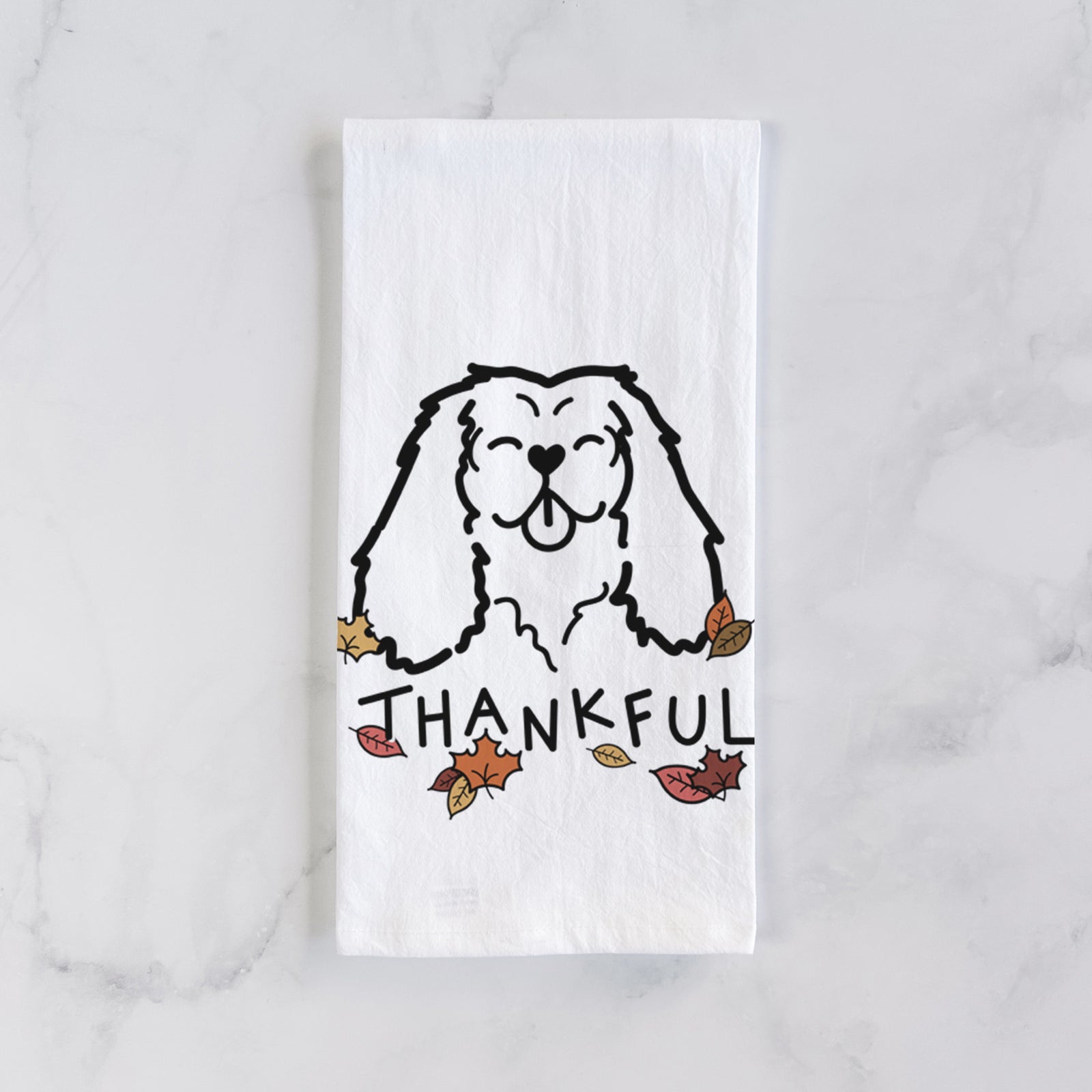 Minimalist line drawing of a Cavalier King Charles Spaniel with 'Thankful' lettering on a tea towel