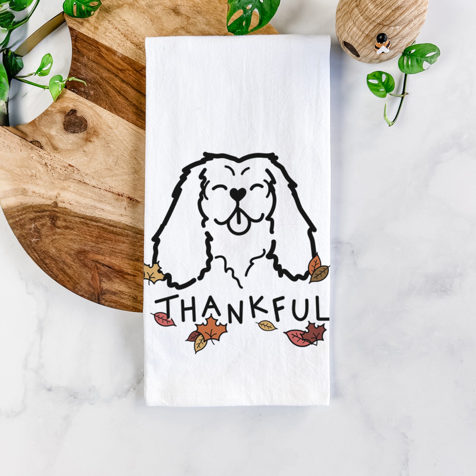 Minimalist line drawing of a Cavalier King Charles Spaniel with 'Thankful' lettering on a tea towel