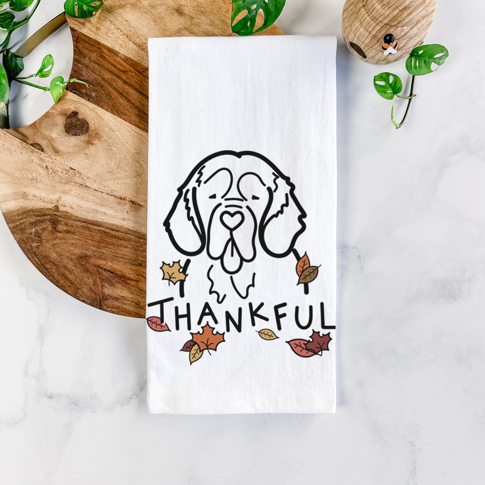 Minimalist line drawing of a Clumber Spaniel with 'Thankful' lettering on a tea towel