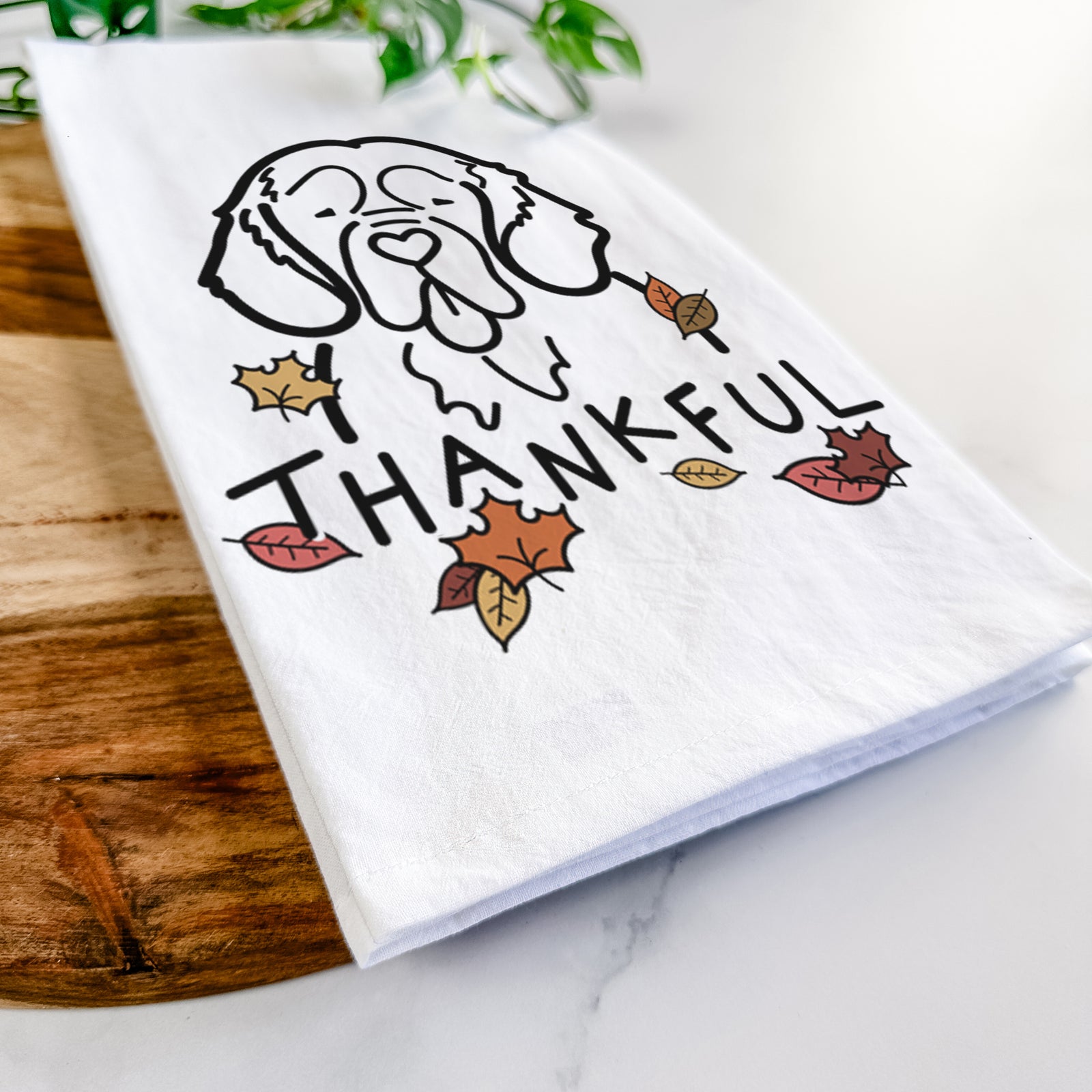 Minimalist line drawing of a Clumber Spaniel with 'Thankful' lettering on a tea towel