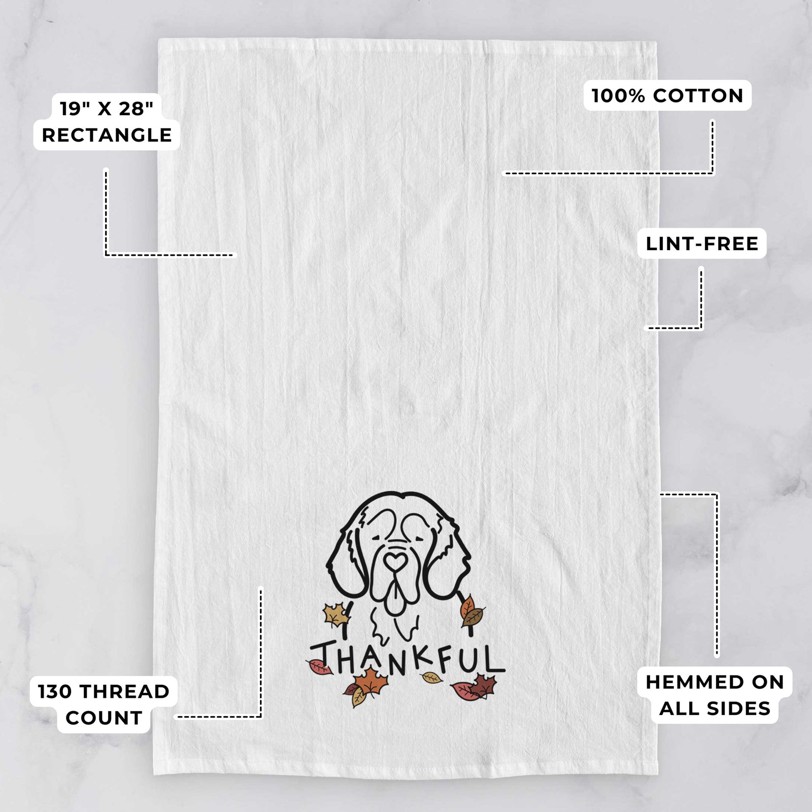 Minimalist line drawing of a Clumber Spaniel with 'Thankful' lettering on a tea towel, with feature callouts: 19 x 28 inch rectangle, 100% cotton, lint-free, 120 thread count, hemmed on all sides