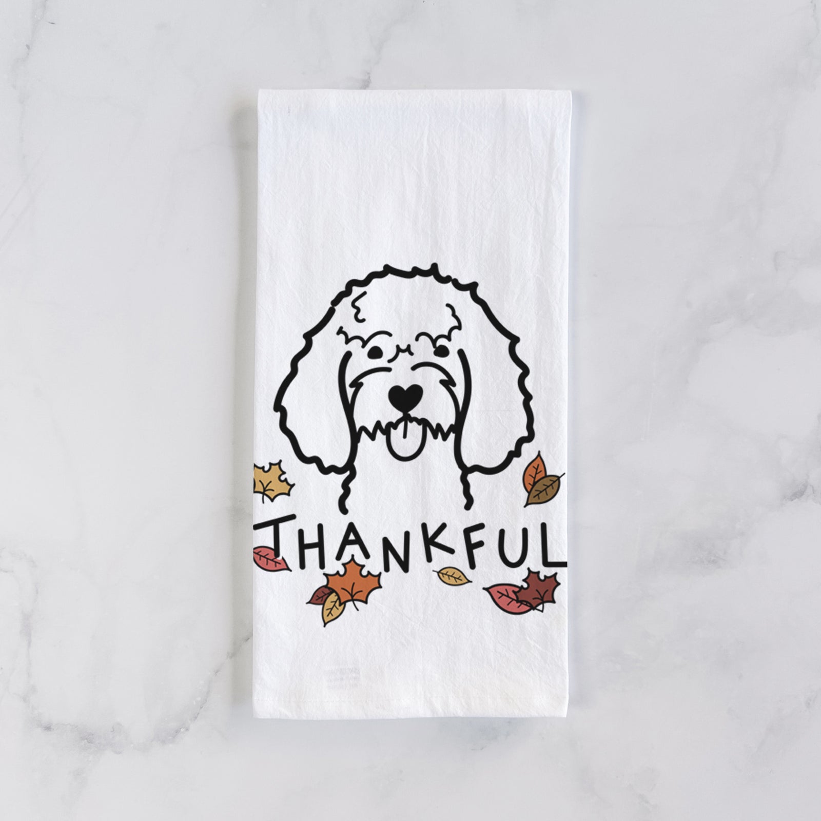 Minimalist line drawing of a Cockapoo with 'Thankful' lettering on a tea towel