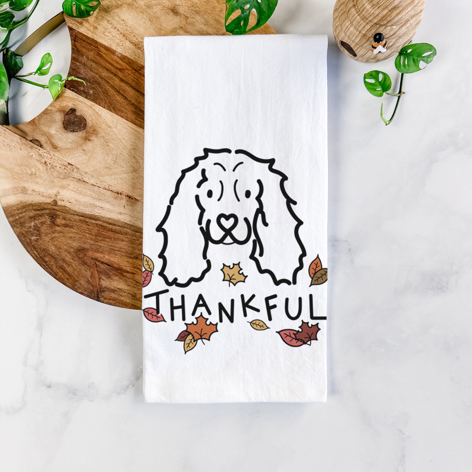 Minimalist line drawing of an American Cocker Spaniel with 'Thankful' lettering on a tea towel