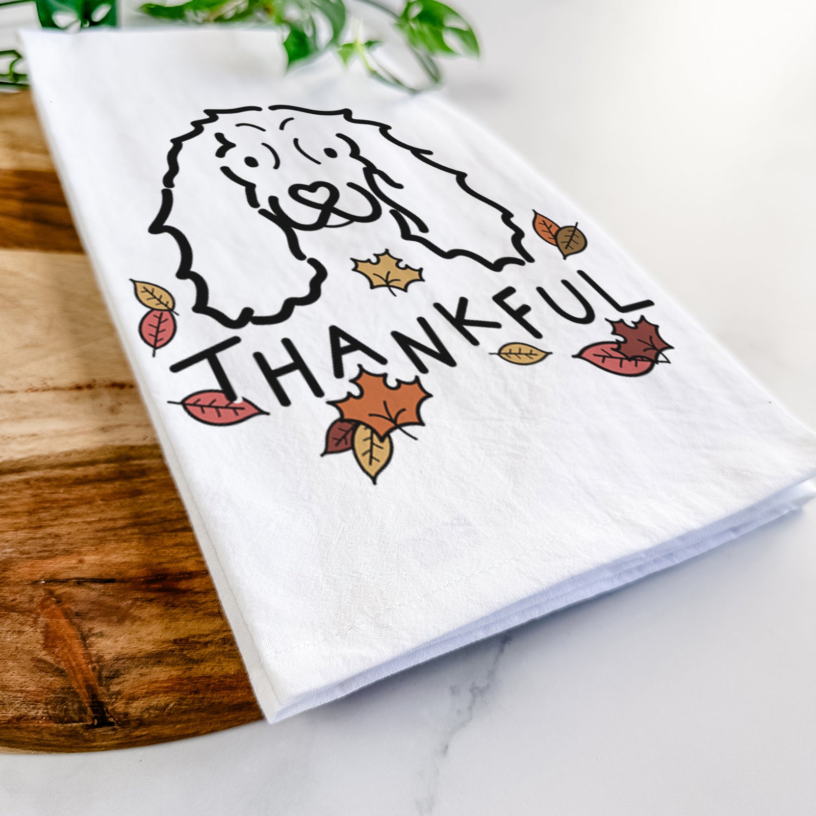 Minimalist line drawing of an American Cocker Spaniel with 'Thankful' lettering on a tea towel