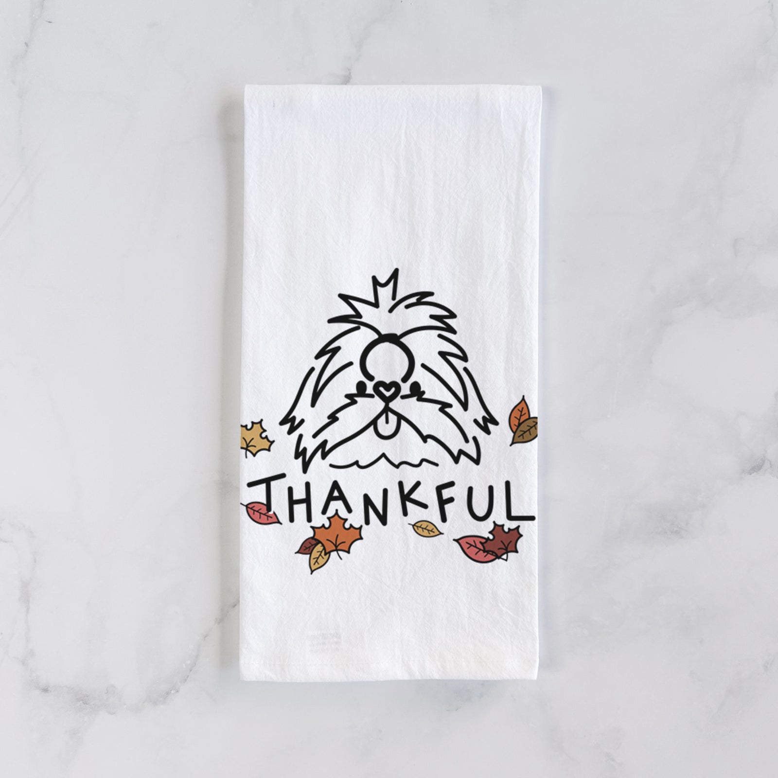 Minimalist line drawing of CoCo the Shih Tzu with 'Thankful' lettering on a tea towel