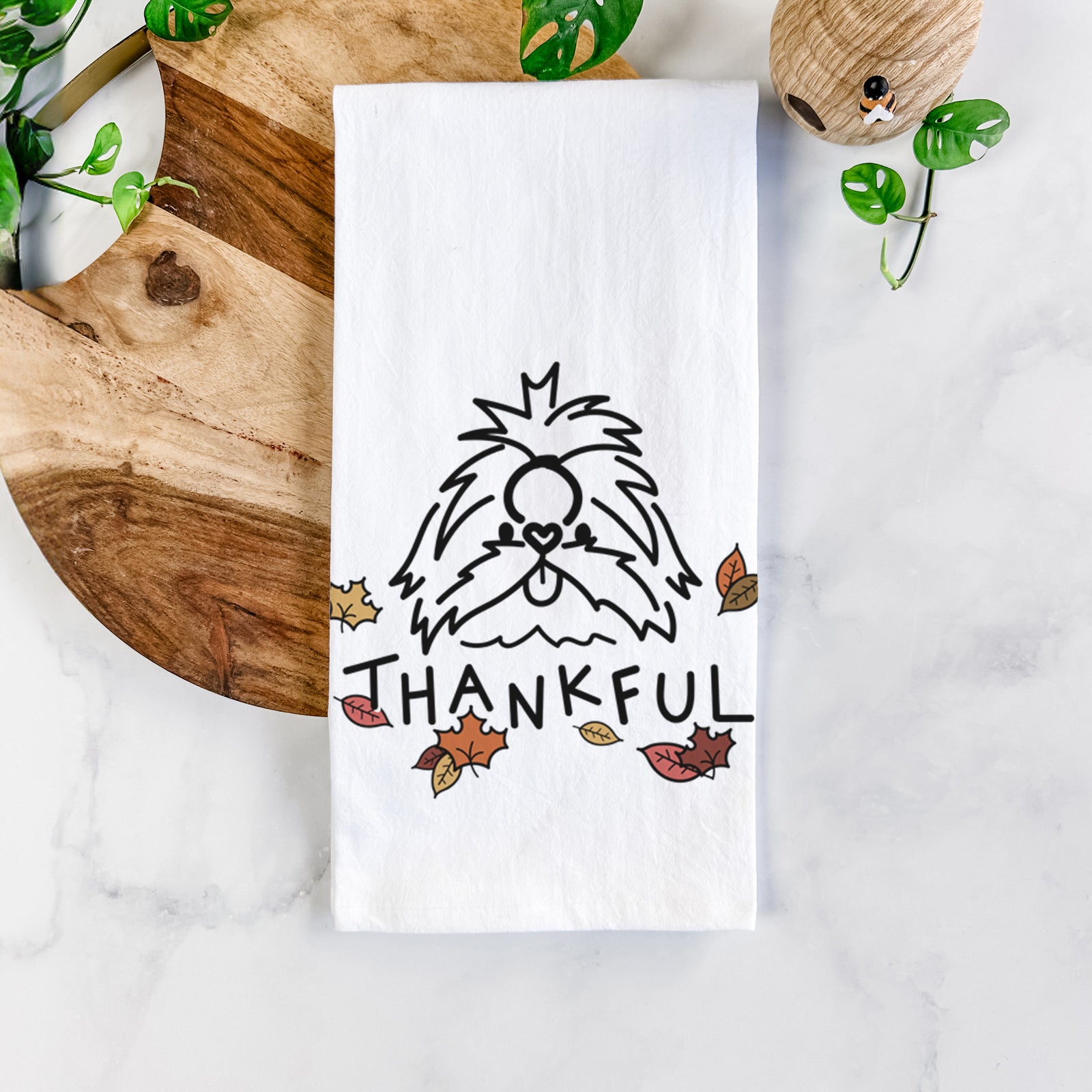 Minimalist line drawing of CoCo the Shih Tzu with 'Thankful' lettering on a tea towel