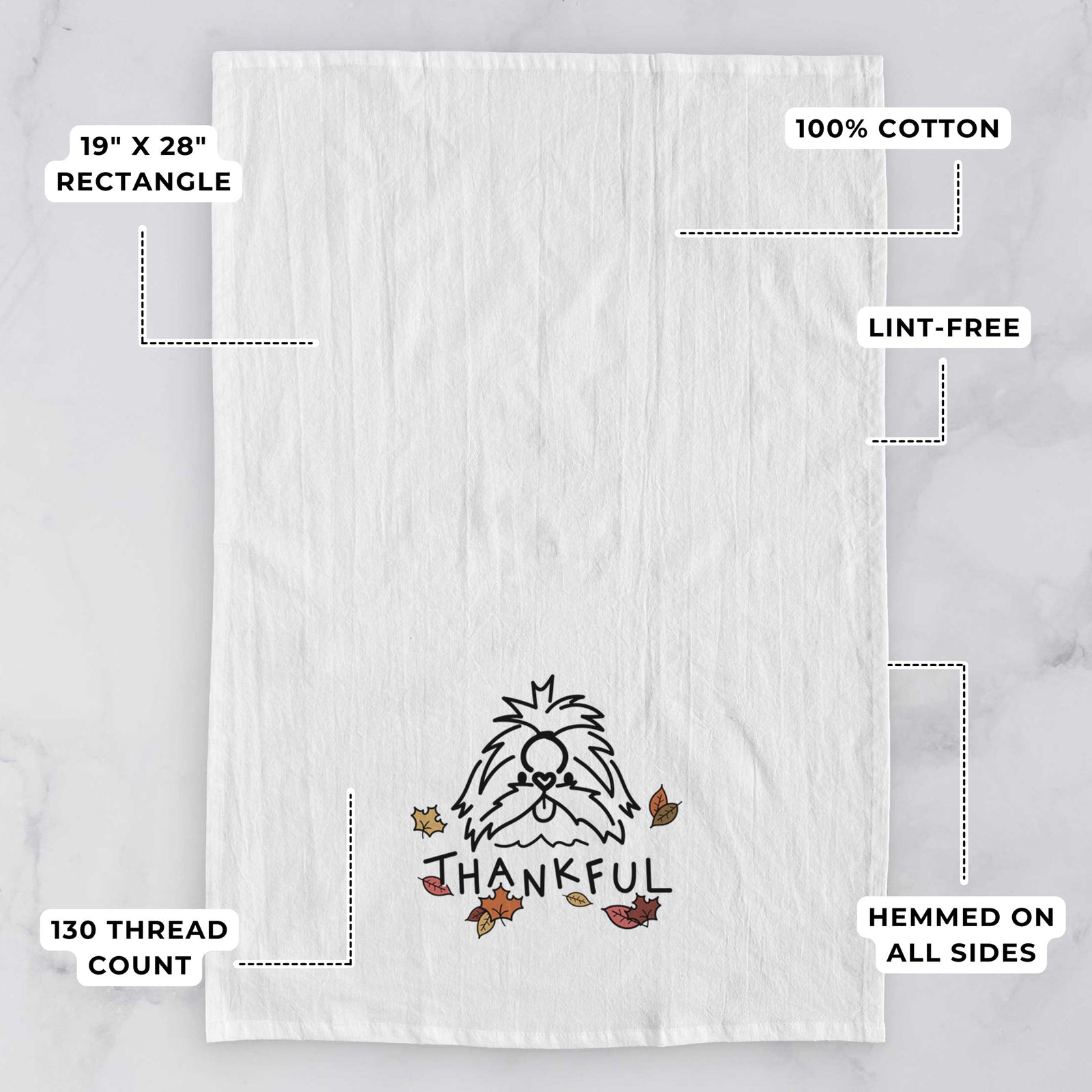 Minimalist line drawing of CoCo the Shih Tzu with 'Thankful' lettering on a tea towel, with feature callouts: 19 x 28 inch rectangle, 100% cotton, lint-free, 120 thread count, hemmed on all sides