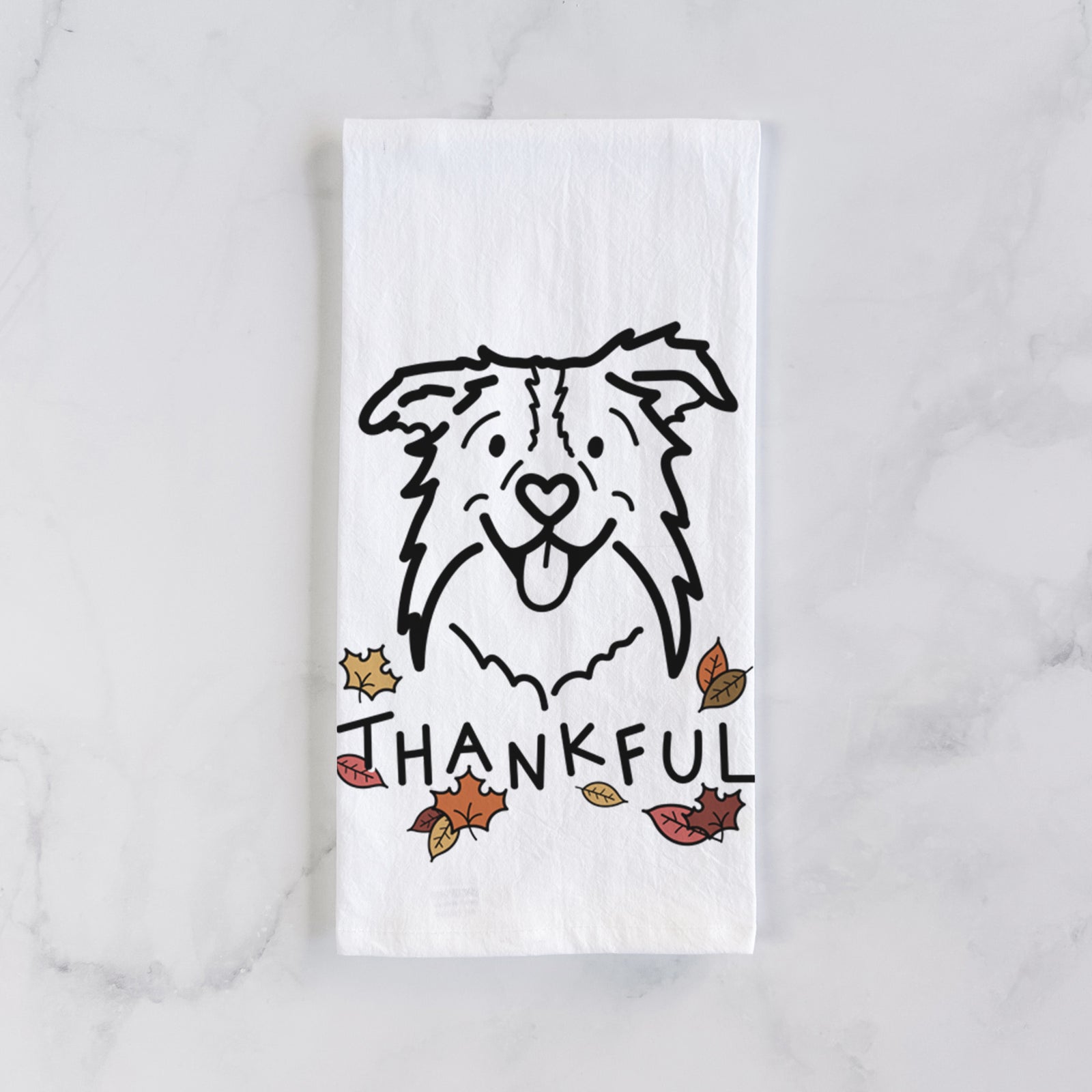 Minimalist line drawing of Cricket the Border Collie with 'Thankful' lettering on a tea towel