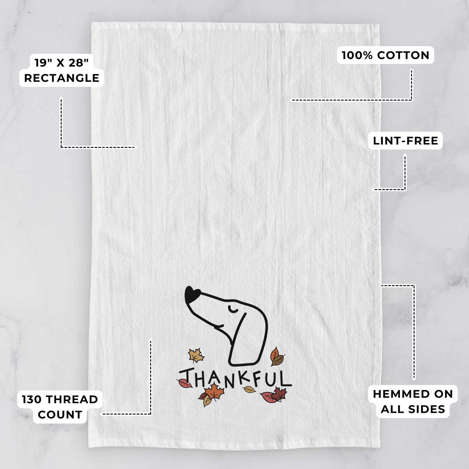 Minimalist line drawing of a Dachshund with 'Thankful' lettering on a tea towel, with feature callouts: 19 x 28 inch rectangle, 100% cotton, lint-free, 120 thread count, hemmed on all sides