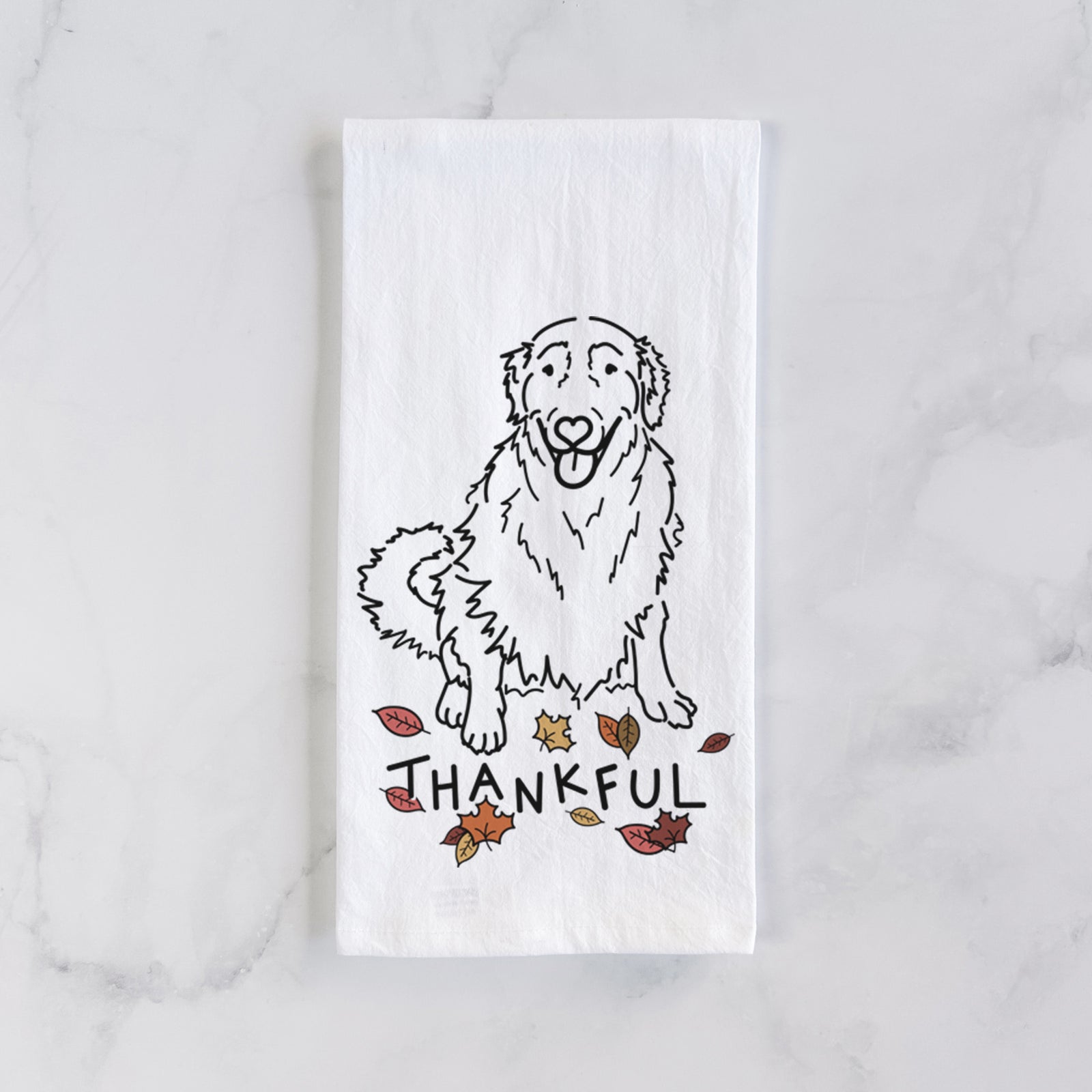 Minimalist line drawing of Daisy the Golden Retriever with 'Thankful' lettering on a tea towel