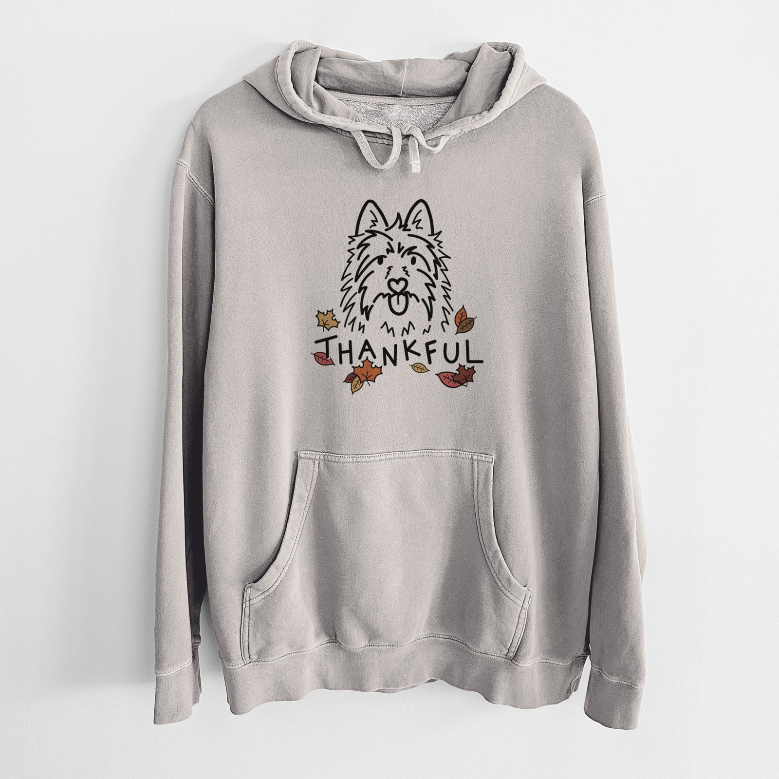 Minimalist line drawing of Digger the Australian Terrier with 'Thankful' lettering on a Cement Unisex pigment dyed hoodie