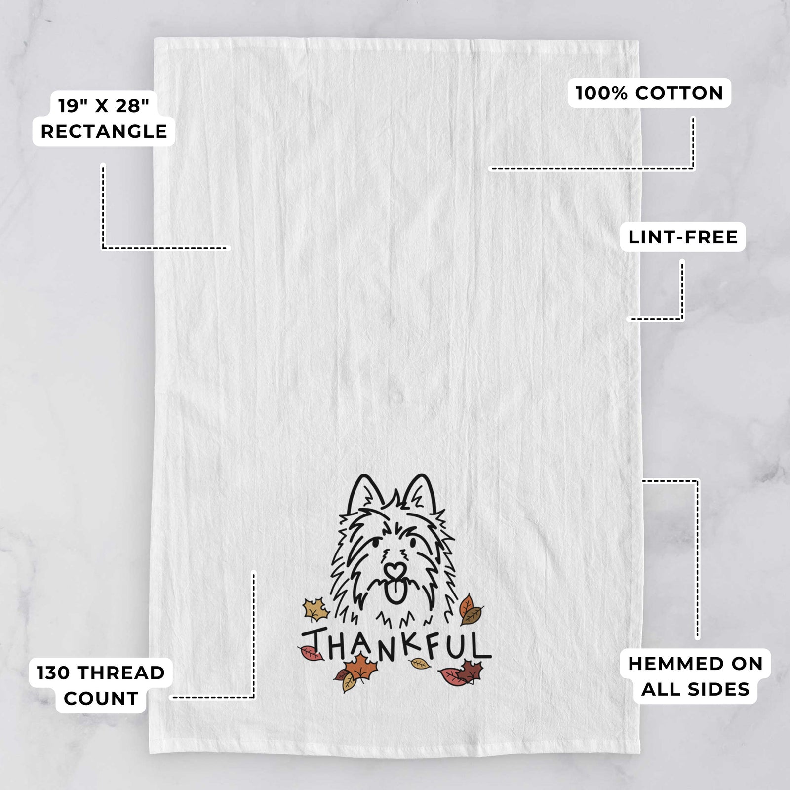 Minimalist line drawing of Digger the Australian Terrier with 'Thankful' lettering on a tea towel, with feature callouts: 19 x 28 inch rectangle, 100% cotton, lint-free, 120 thread count, hemmed on all sides