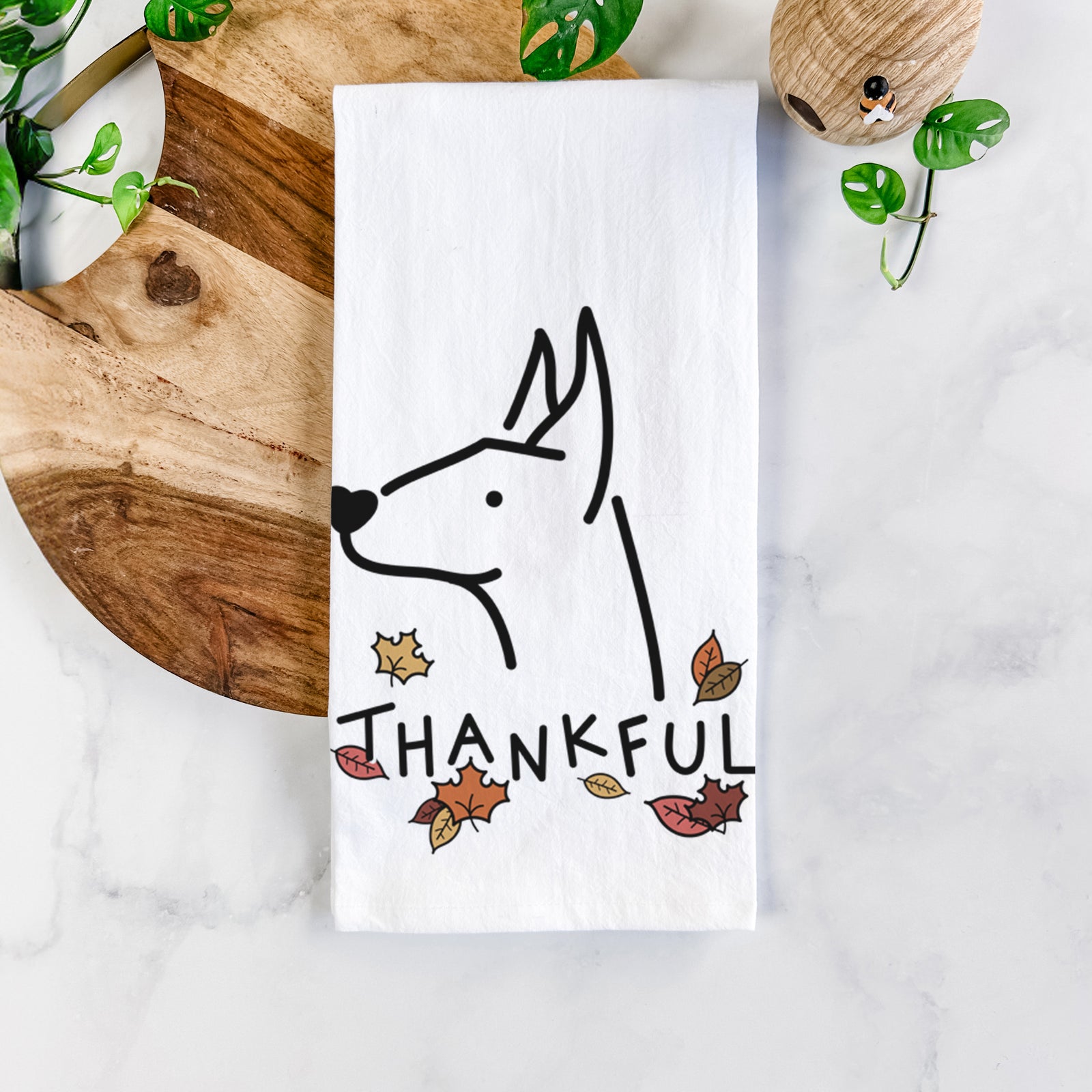 Minimalist line drawing of a Doberman Pinscher with 'Thankful' lettering on a tea towel
