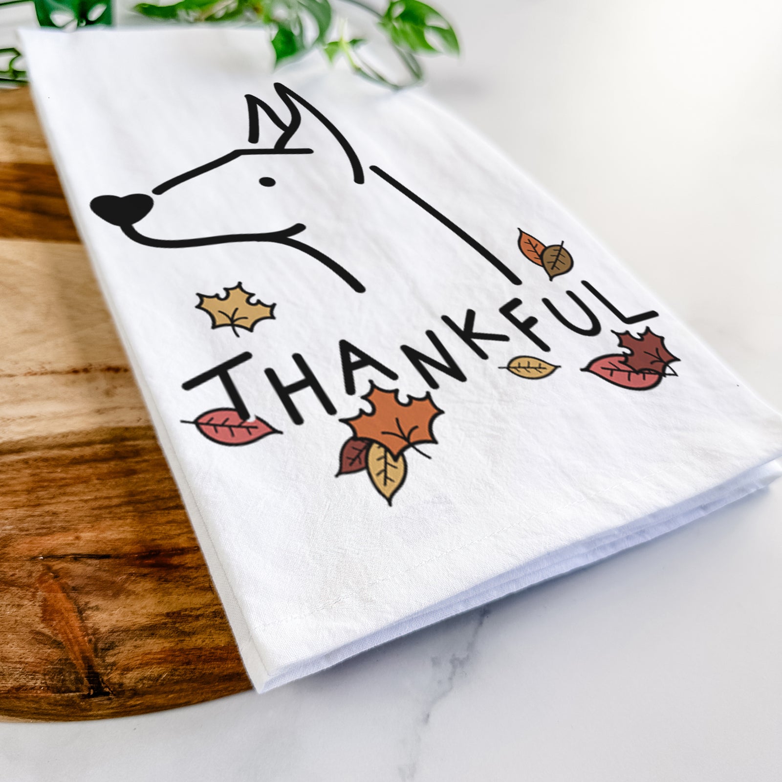 Minimalist line drawing of a Doberman Pinscher with 'Thankful' lettering on a tea towel