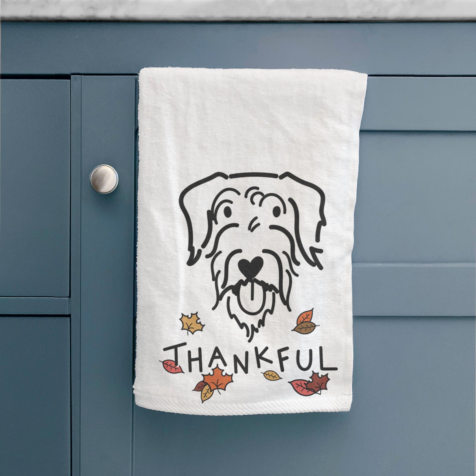 Minimalist line drawing of Dug the Doodle with 'Thankful' lettering on a decorative hand towel