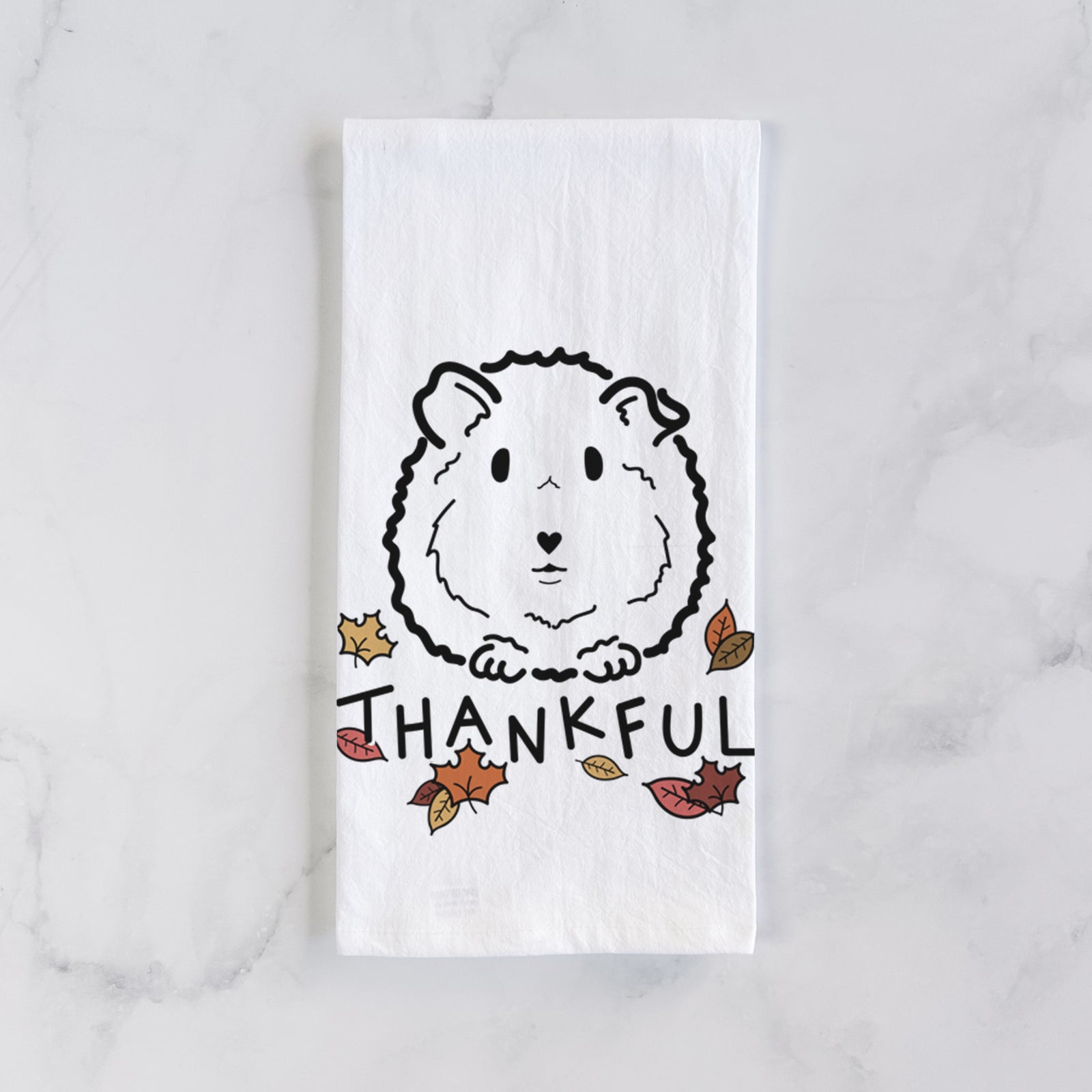 Minimalist line drawing of Duke the Guinea Pig with 'Thankful' lettering on a tea towel