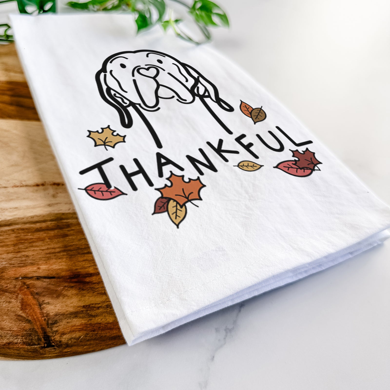 Minimalist line drawing of an English Pointer with 'Thankful' lettering on a tea towel