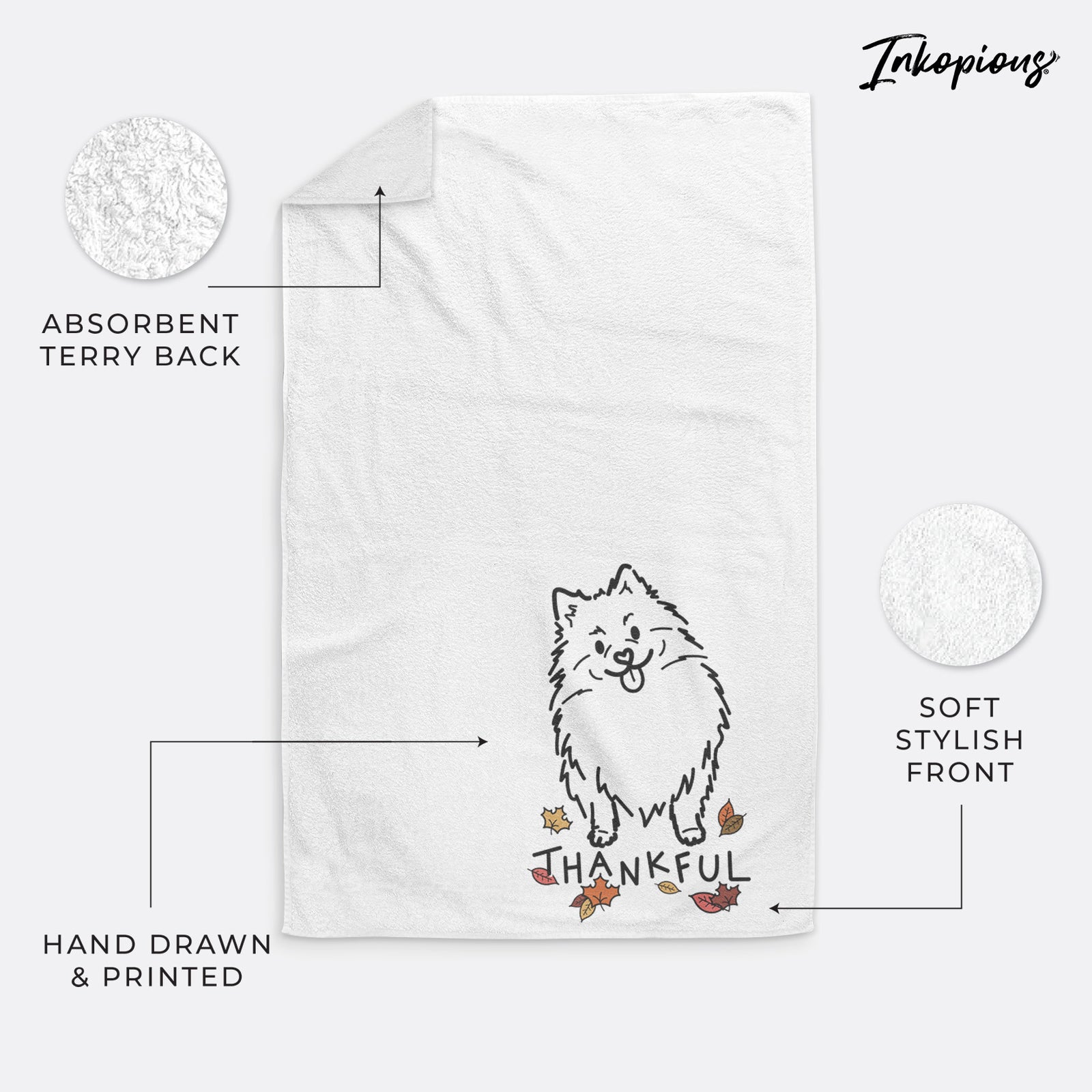 Minimalist line drawing of Fern the Pomeranian with 'Thankful' lettering on a decorative hand towel