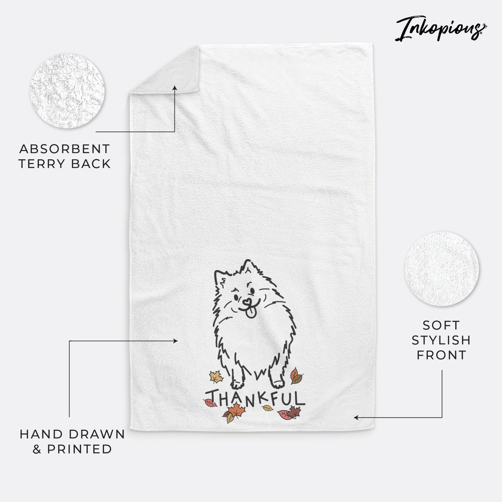 Minimalist line drawing of Fern the Pomeranian with 'Thankful' lettering on a decorative hand towel