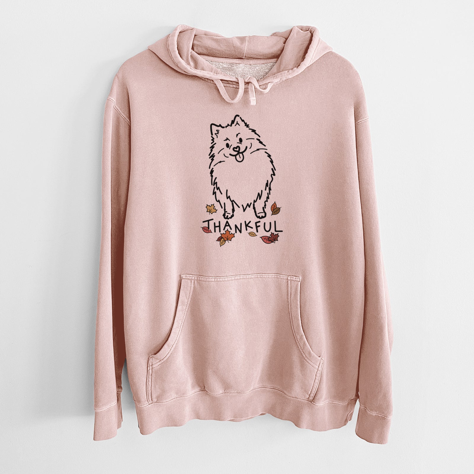 Minimalist line drawing of Fern the Pomeranian with 'Thankful' lettering on a Dusty Pink Unisex pigment dyed hoodie