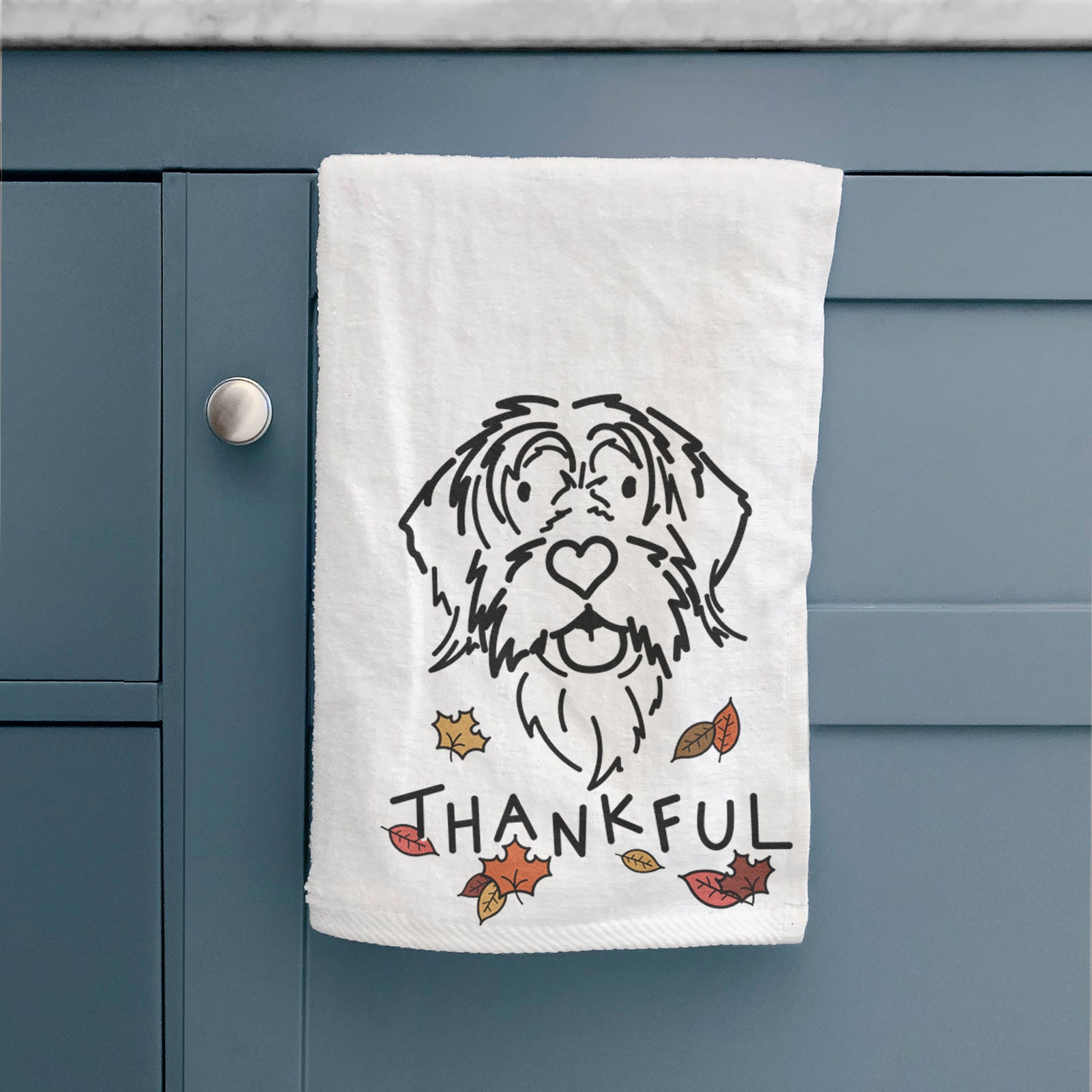 Minimalist line drawing of Gary the Wirehaird Pointing Griffon with 'Thankful' lettering on a hand towel
