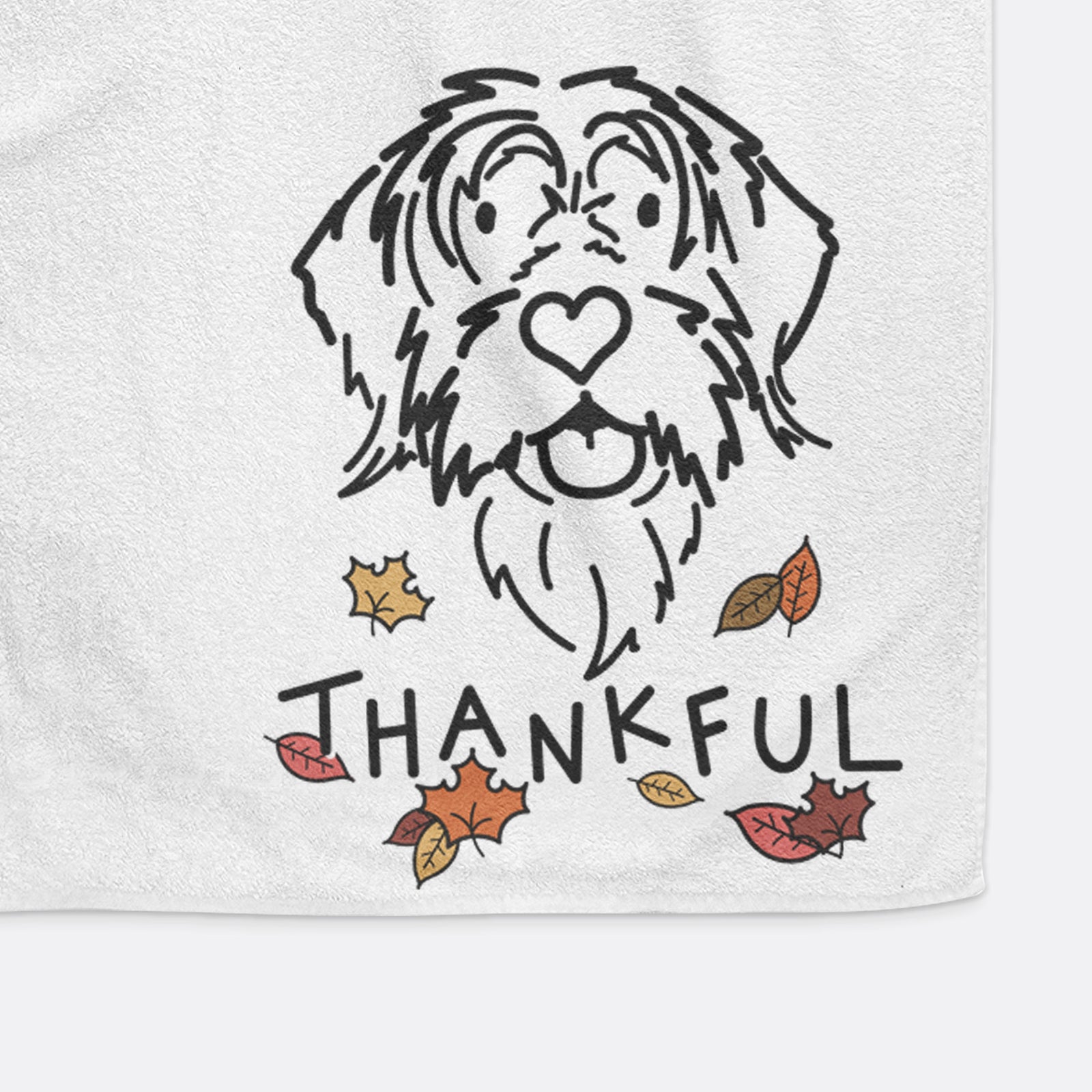 Minimalist line drawing of Gary the Wirehaird Pointing Griffon with 'Thankful' lettering on a hand towel