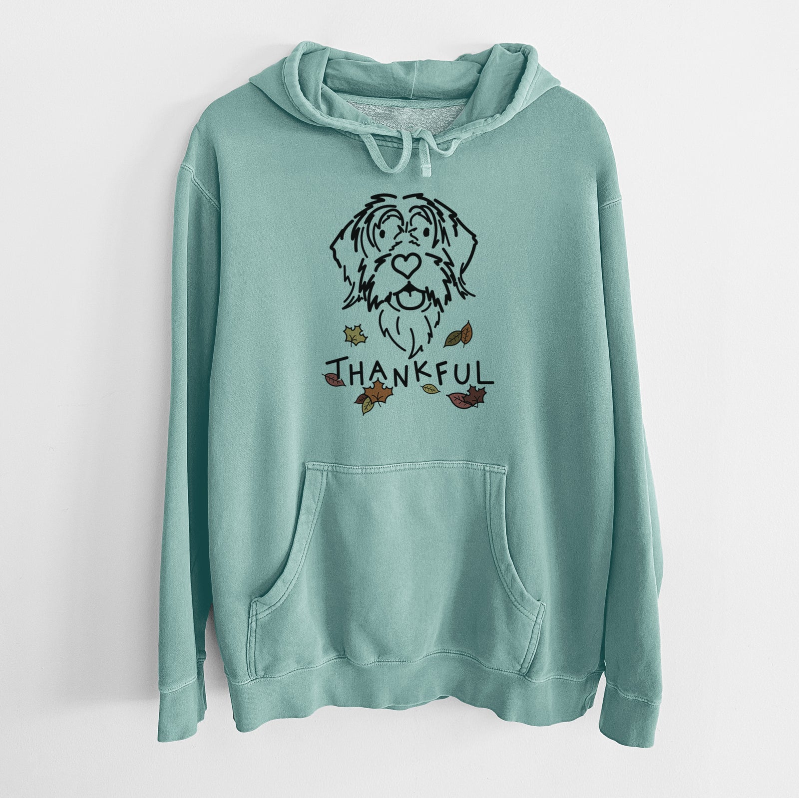 Minimalist line drawing of Gary the Wirehaird Pointing Griffon with 'Thankful' lettering on a Mint Unisex pigment dyed hoodie