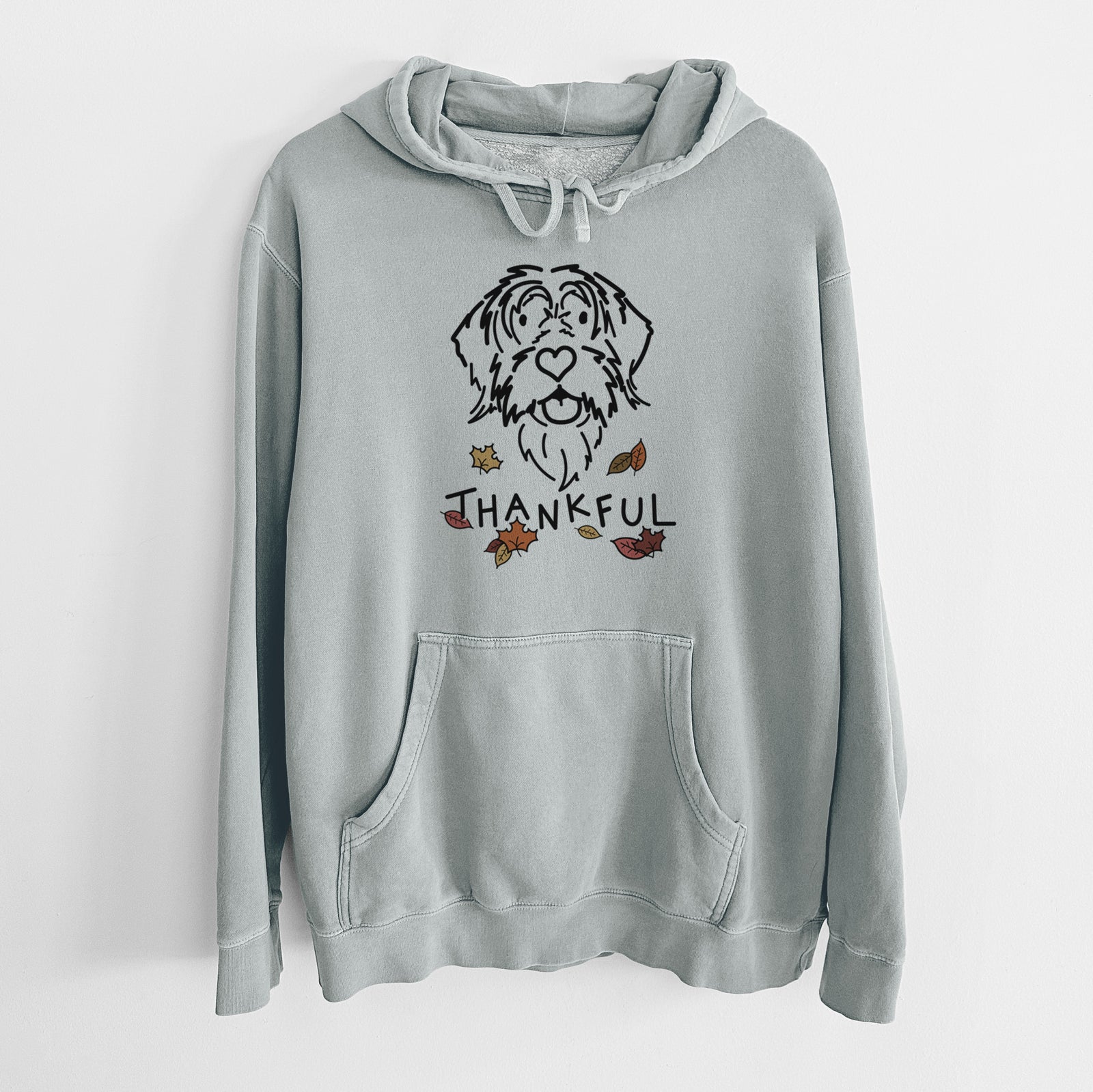 Minimalist line drawing of Gary the Wirehaird Pointing Griffon with 'Thankful' lettering on a Sage Unisex pigment dyed hoodie