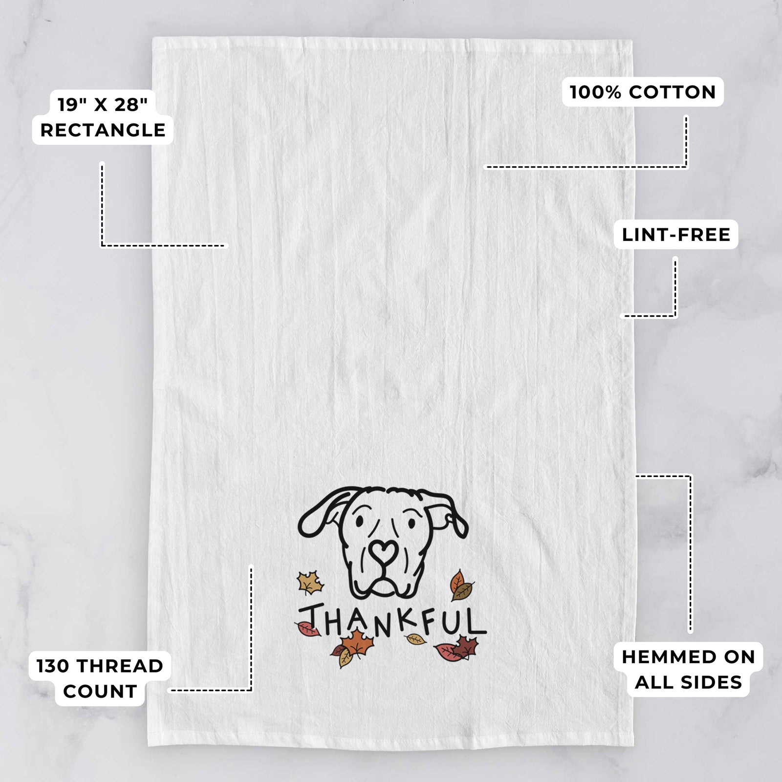 Minimalist line drawing of Genevieve the Dogo Argentino with 'Thankful' lettering on a tea towel, with feature callouts: 19 x 28 inch rectangle, 100% cotton, lint-free, 120 thread count, hemmed on all sides