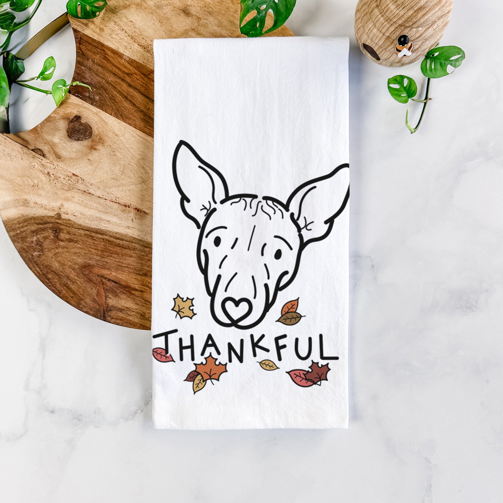 Minimalist line drawing of Georgia the American Hairless Terrier with 'Thankful' lettering on a tea towel