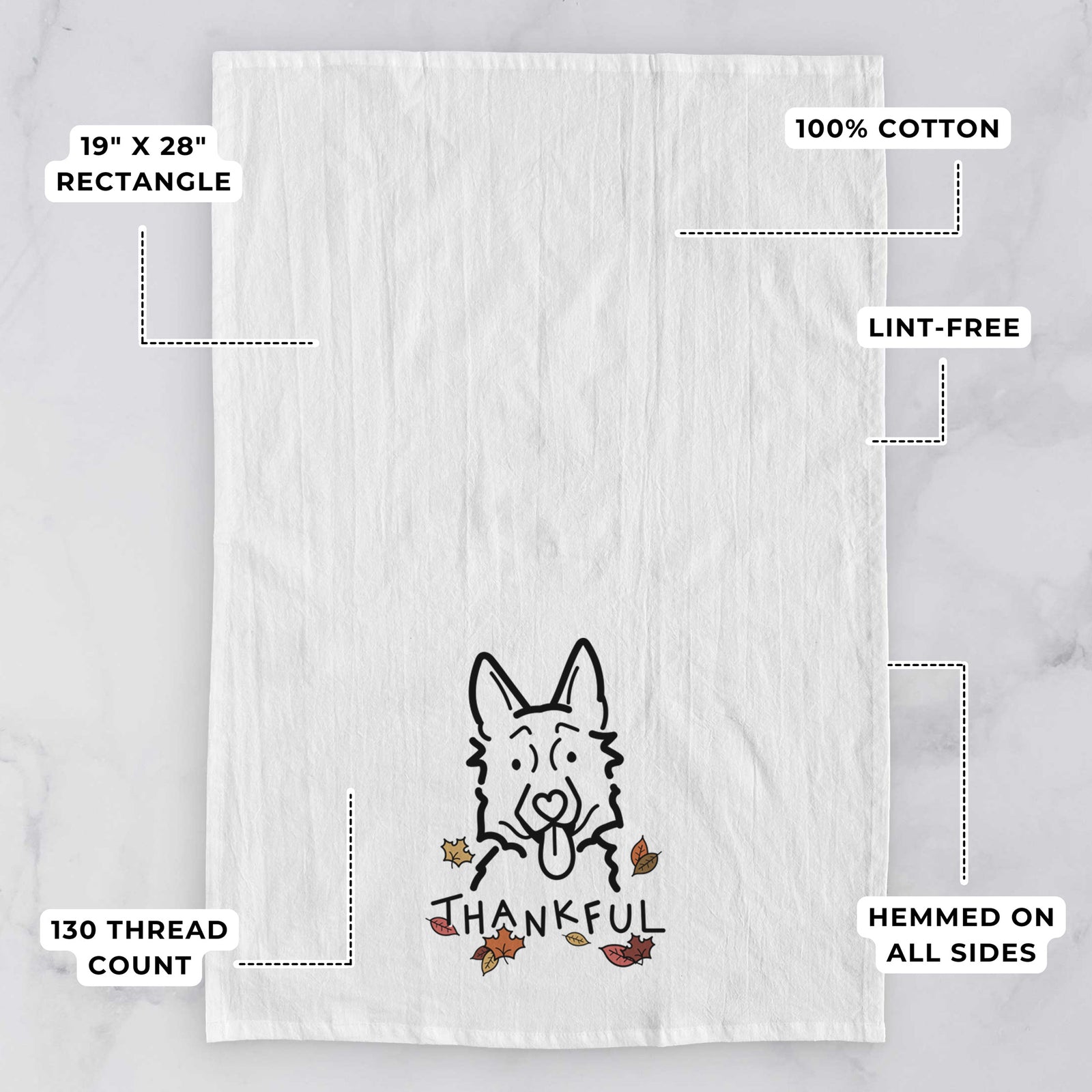 Minimalist line drawing of a German Shepherd with 'Thankful' lettering on a tea towel, with feature callouts: 19 x 28 inch rectangle, 100% cotton, lint-free, 120 thread count, hemmed on all sides