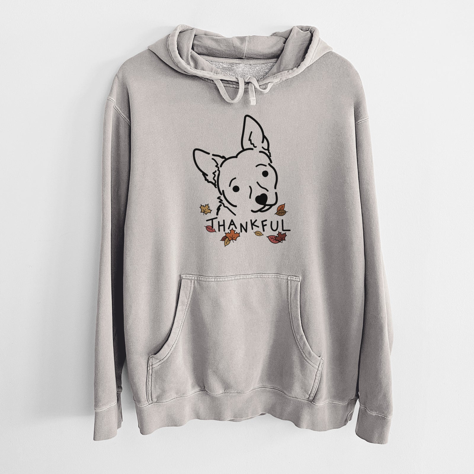 Minimalist line drawing of GiGi the Chihuahua Mix with 'Thankful' lettering on a Cement Unisex pigment dyed hoodie