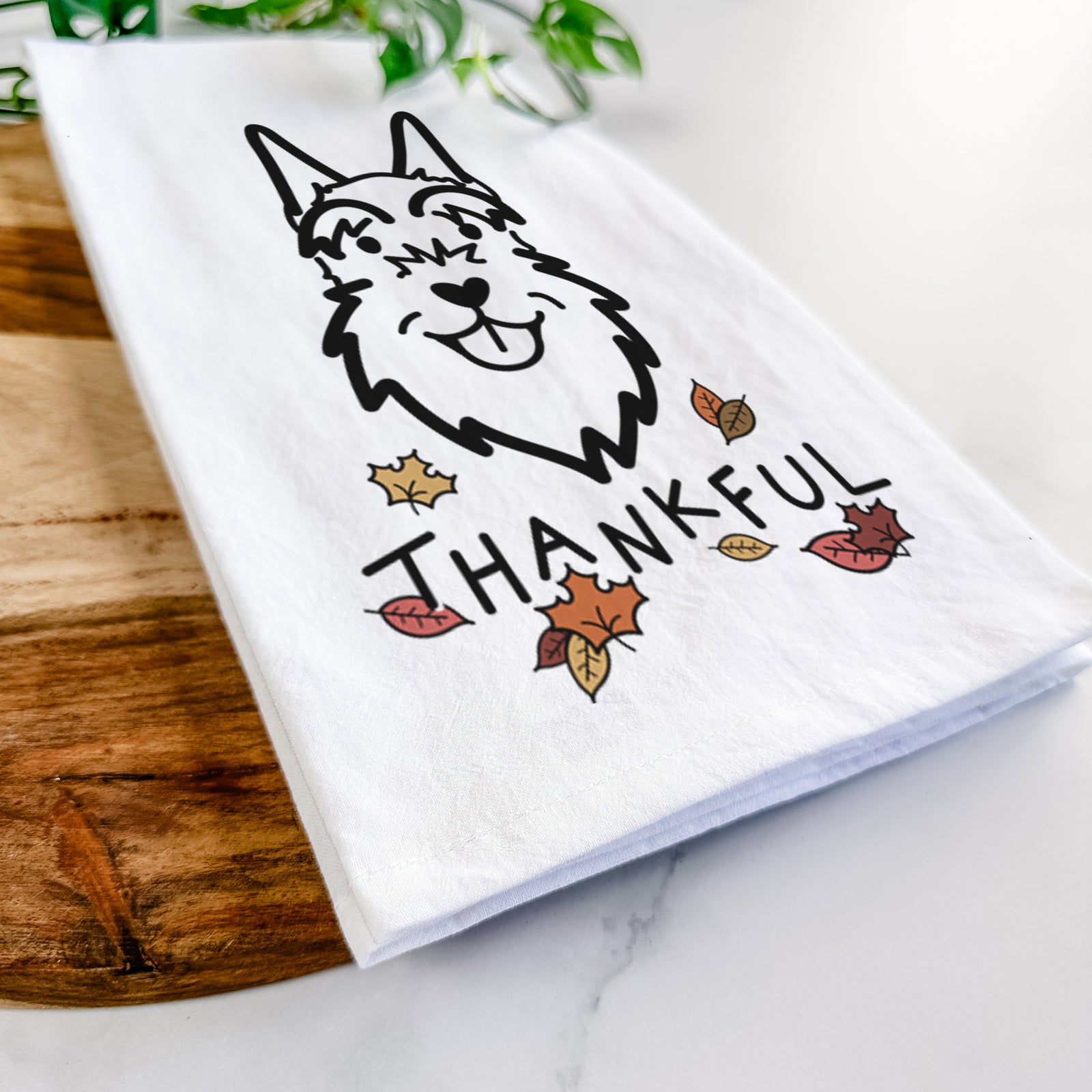 Minimalist line drawing of a Schnauzer Cropped Ears with 'Thankful' lettering on a tea towel