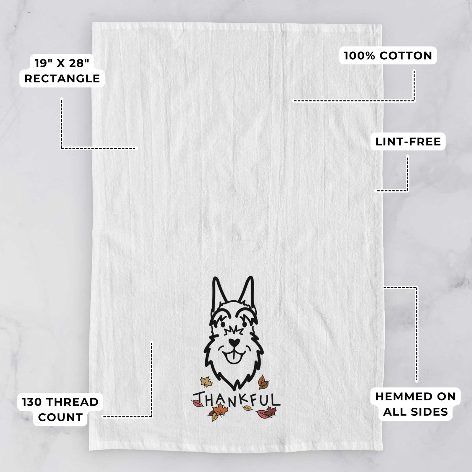 Minimalist line drawing of a Schnauzer Cropped Ears with 'Thankful' lettering on a tea towel, with feature callouts: 19 x 28 inch rectangle, 100% cotton, lint-free, 120 thread count, hemmed on all sides