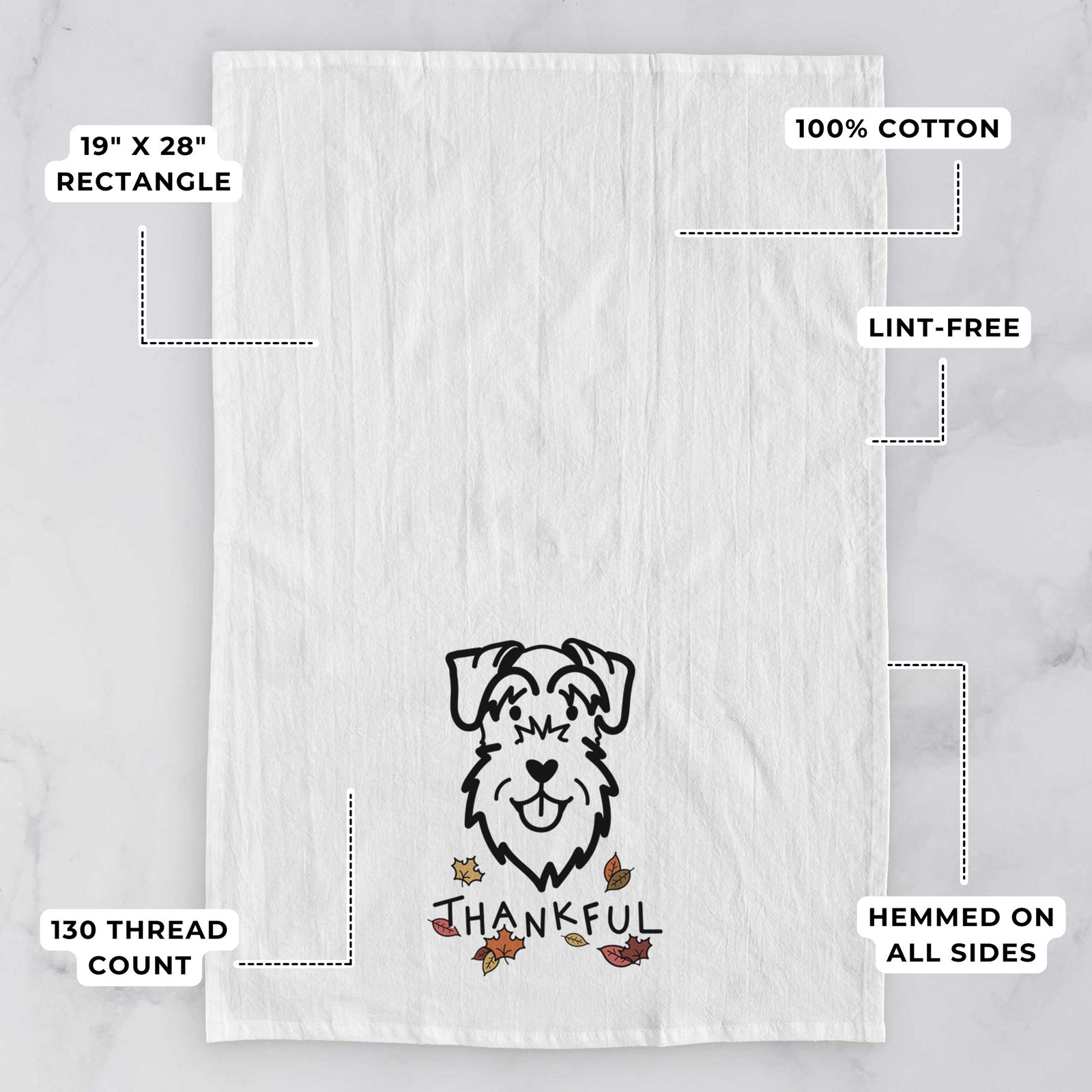 Minimalist line drawing of a Schnauzer Natural Ears with 'Thankful' lettering on a tea towel, with feature callouts: 19 x 28 inch rectangle, 100% cotton, lint-free, 120 thread count, hemmed on all sides