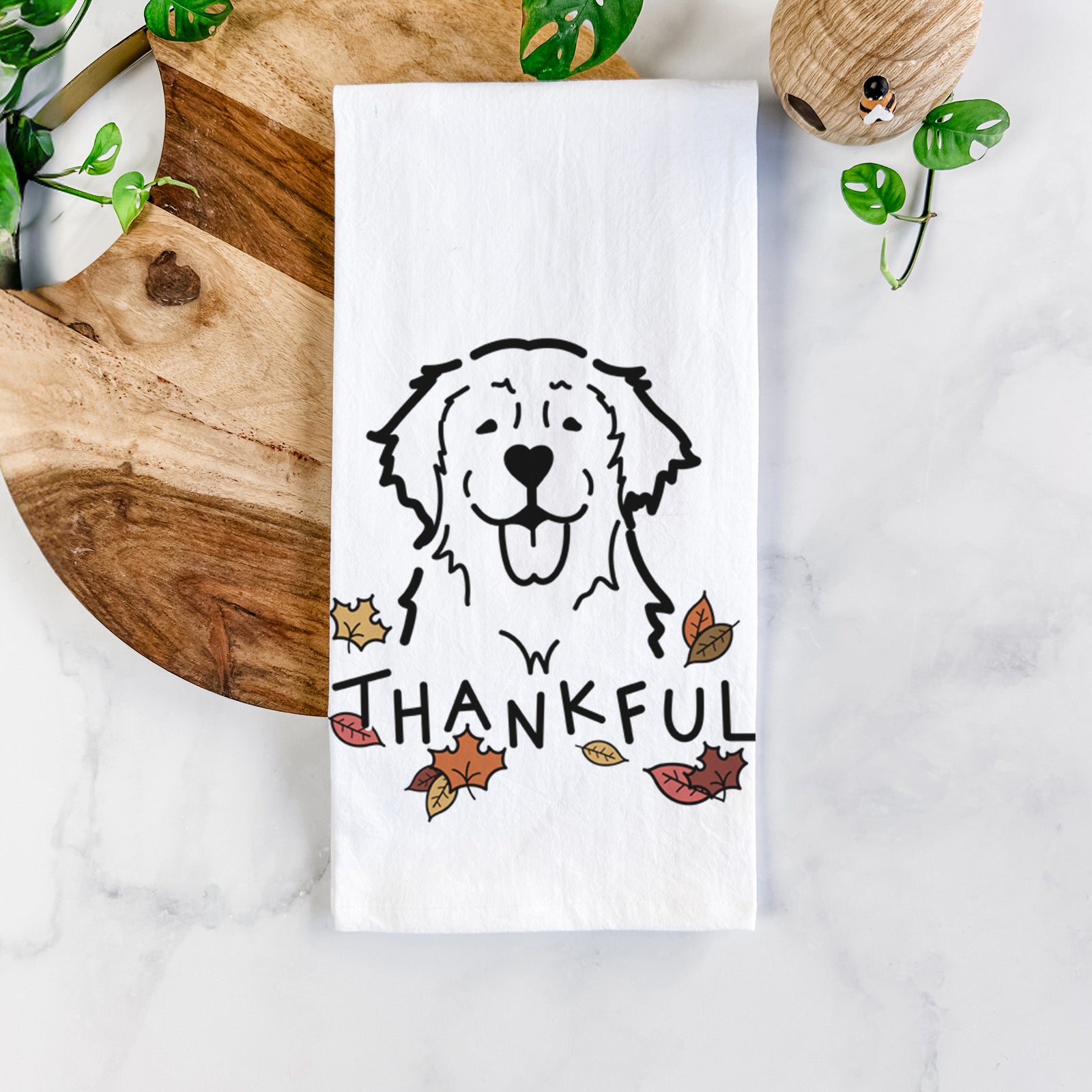 Minimalist line drawing of a Golden Retriever with 'Thankful' lettering on a tea towel