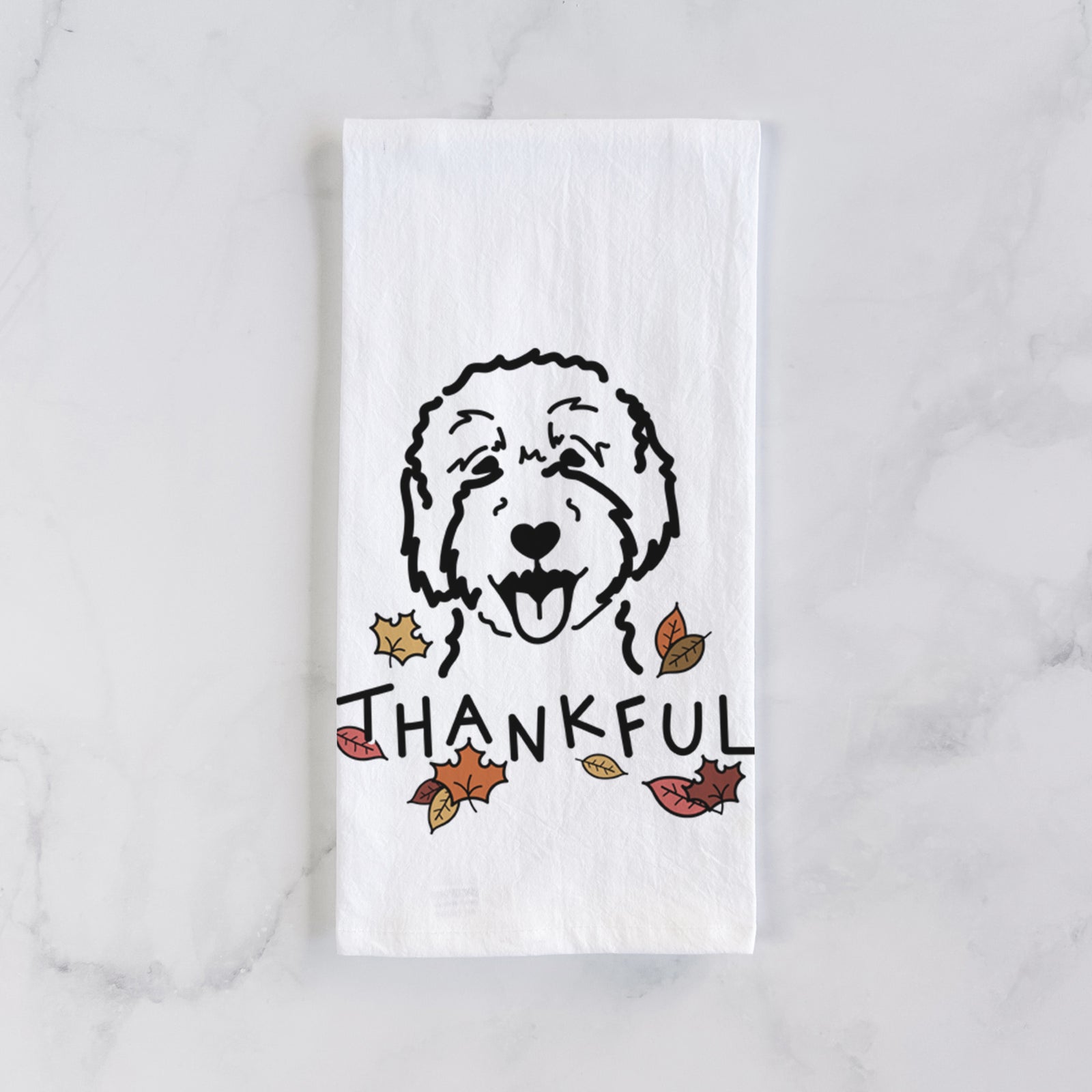Minimalist line drawing of a Goldendoodle 2 with 'Thankful' lettering on a tea towel