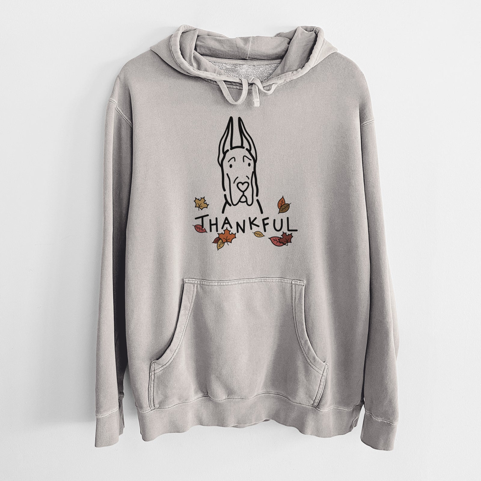 Minimalist line drawing of a Great Dane with Cropped Ears with 'Thankful' lettering on a Cement Unisex pigment dyed hoodie