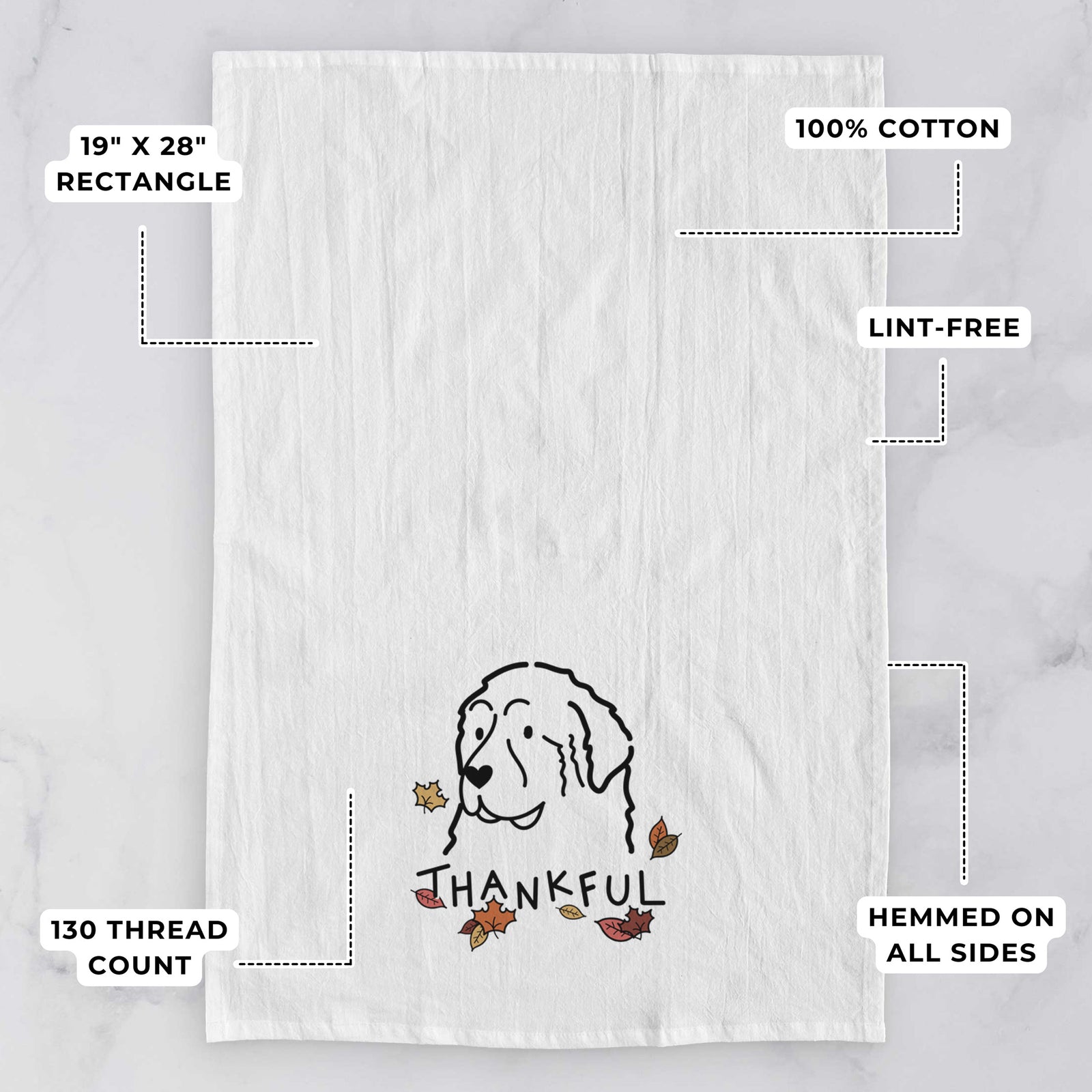 Minimalist line drawing of a Great Pyrenees with 'Thankful' lettering on a tea towel, with feature callouts: 19 x 28 inch rectangle, 100% cotton, lint-free, 120 thread count, hemmed on all sides
