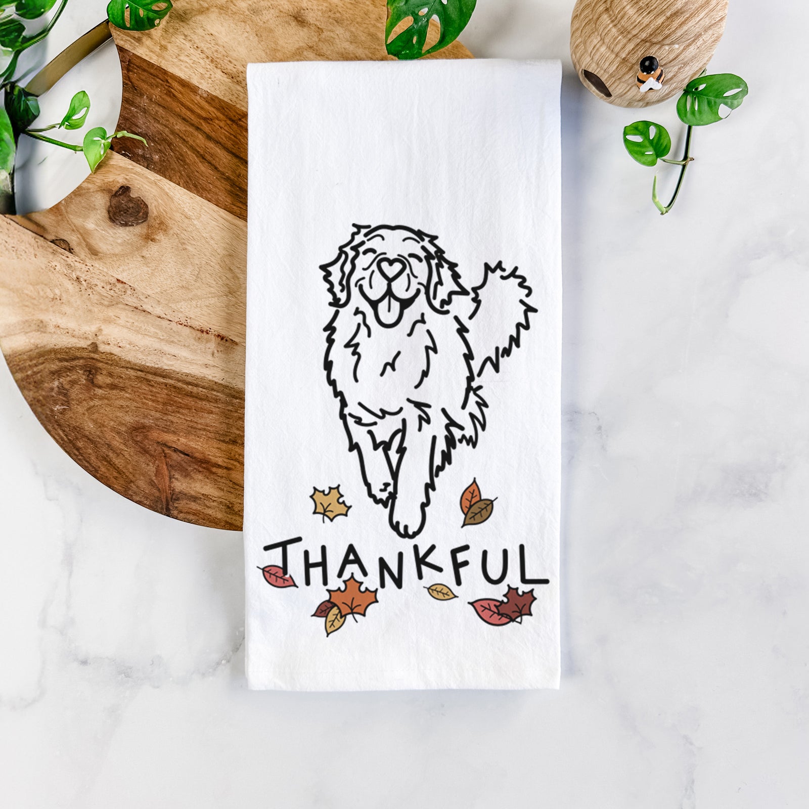 Minimalist line drawing of Hamlet the Golden Retriever with 'Thankful' lettering on a tea towel