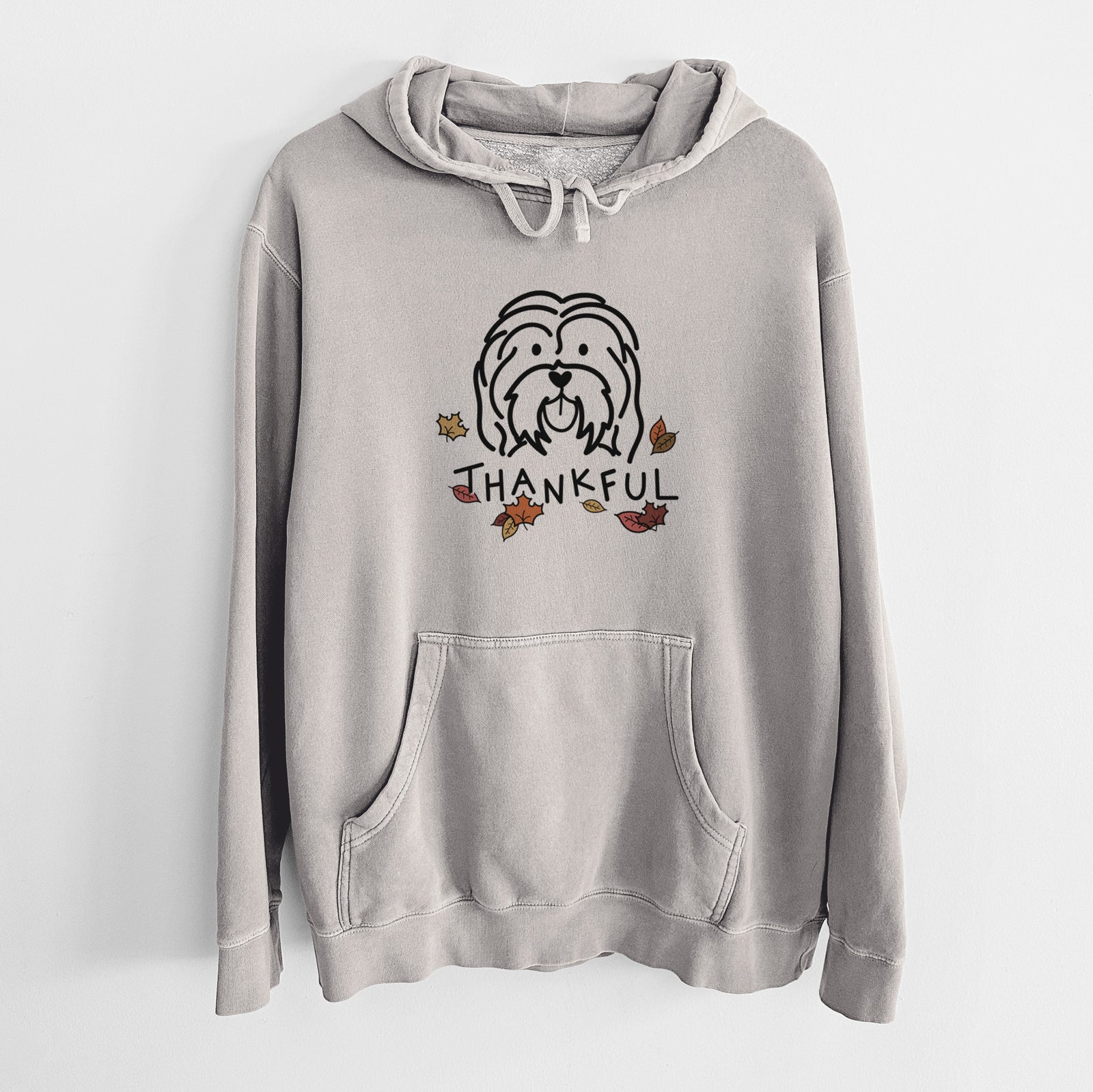 Minimalist line drawing of a Havanese with 'Thankful' lettering on a Cement Unisex pigment dyed hoodie