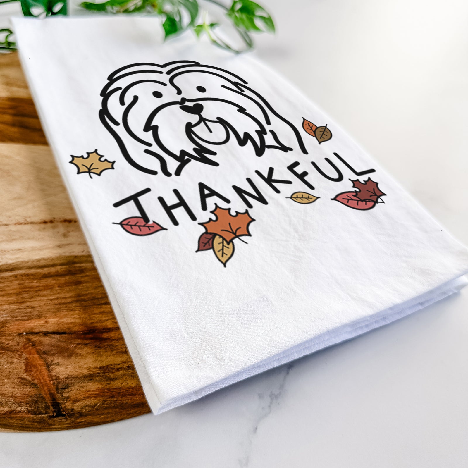 Minimalist line drawing of a Havanese with 'Thankful' lettering on a tea towel