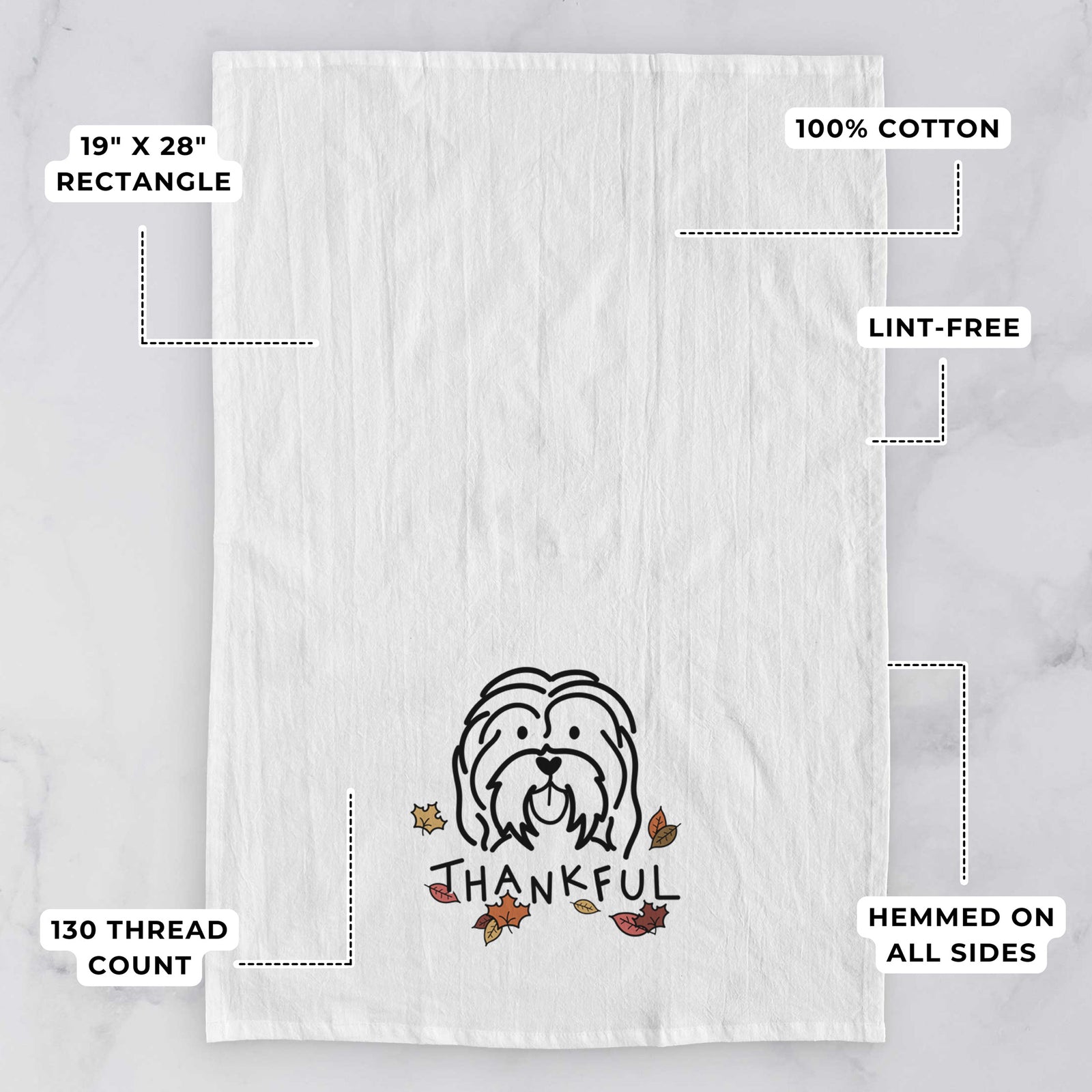 Minimalist line drawing of a Havanese with 'Thankful' lettering on a tea towel, with feature callouts: 19 x 28 inch rectangle, 100% cotton, lint-free, 120 thread count, hemmed on all sides